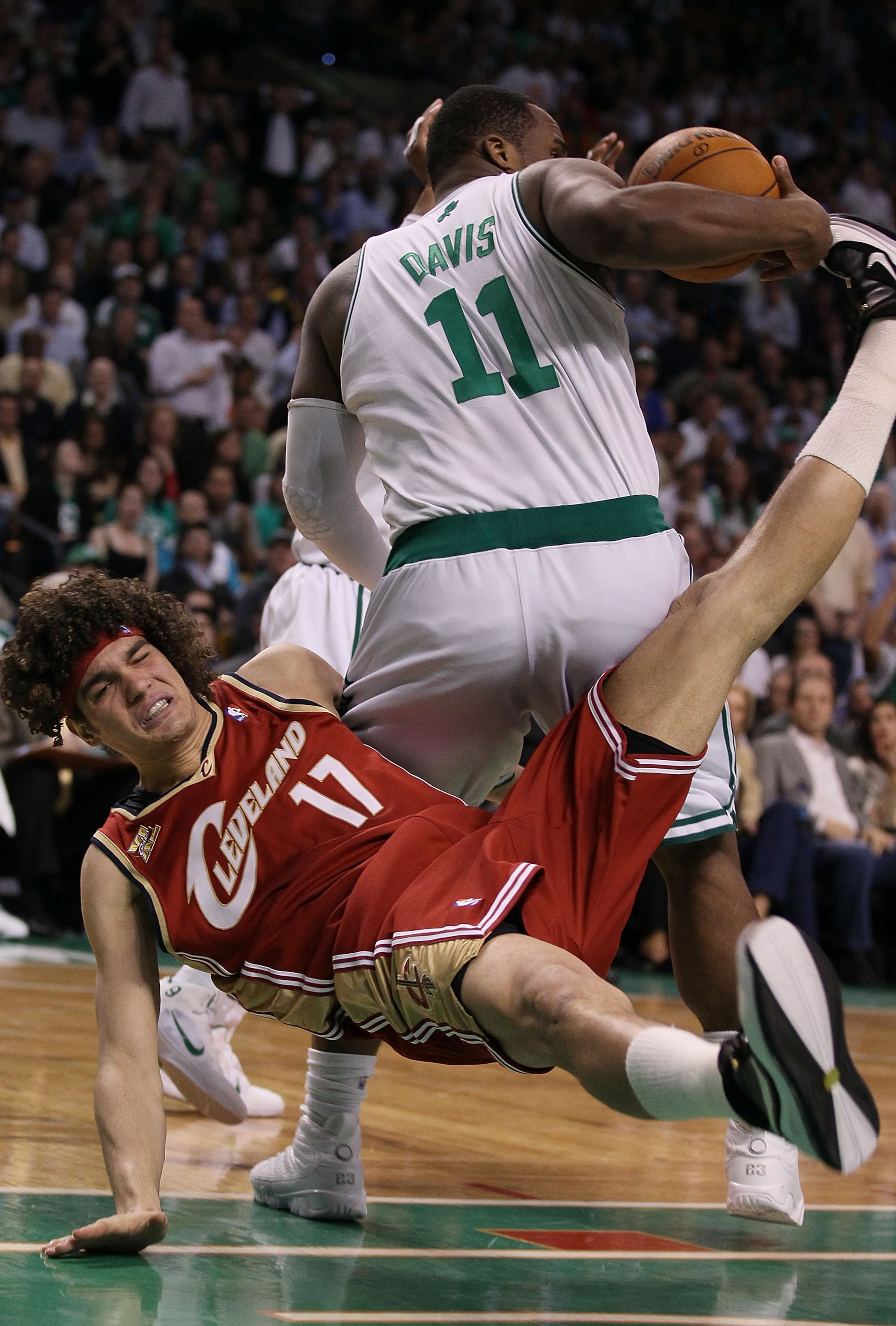 BOSTON - MAY 13: Glen Davis #11 of the Boston Celtics is called for a loose ball foul on this play as Anderson Varejao #17 of the Cleveland Cavaliers falls to the floor during Game Six of the Eastern Conference Semifinals of the 2010 NBA playoffs at TD G BOSTON - MAY 13: Glen Davis #11 of the Boston Celtics is called for a loose ball foul on this play as Anderson Varejao #17 of the Cleveland Cavaliers falls to the floor during Game Six of the Eastern Conference Semifinals of the 2010 NBA playoffs at TD G