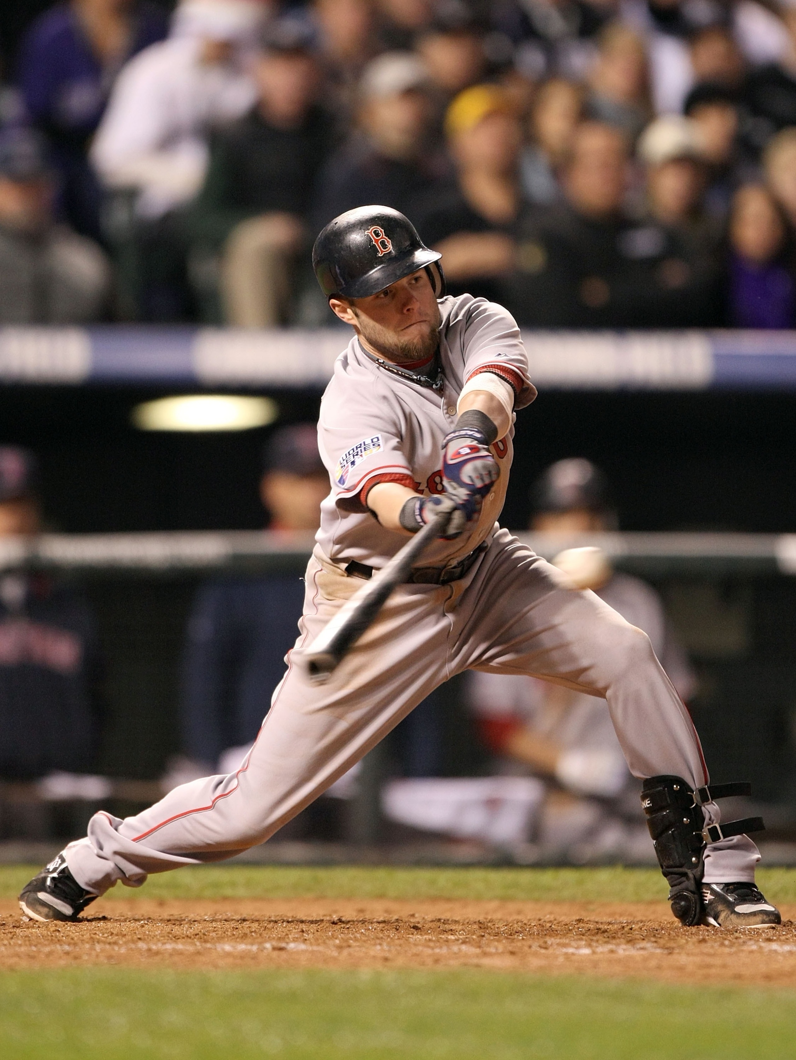 DENVER - OCTOBER 28:  Dustin Pedroia #15 of the Boston Red Sox bats against the Colorado Rockies during Game Four of the 2007 Major League Baseball World Series at Coors Field on October 28, 2007 in Denver, Colorado.  (Photo by Jed Jacobsohn/Getty Images)