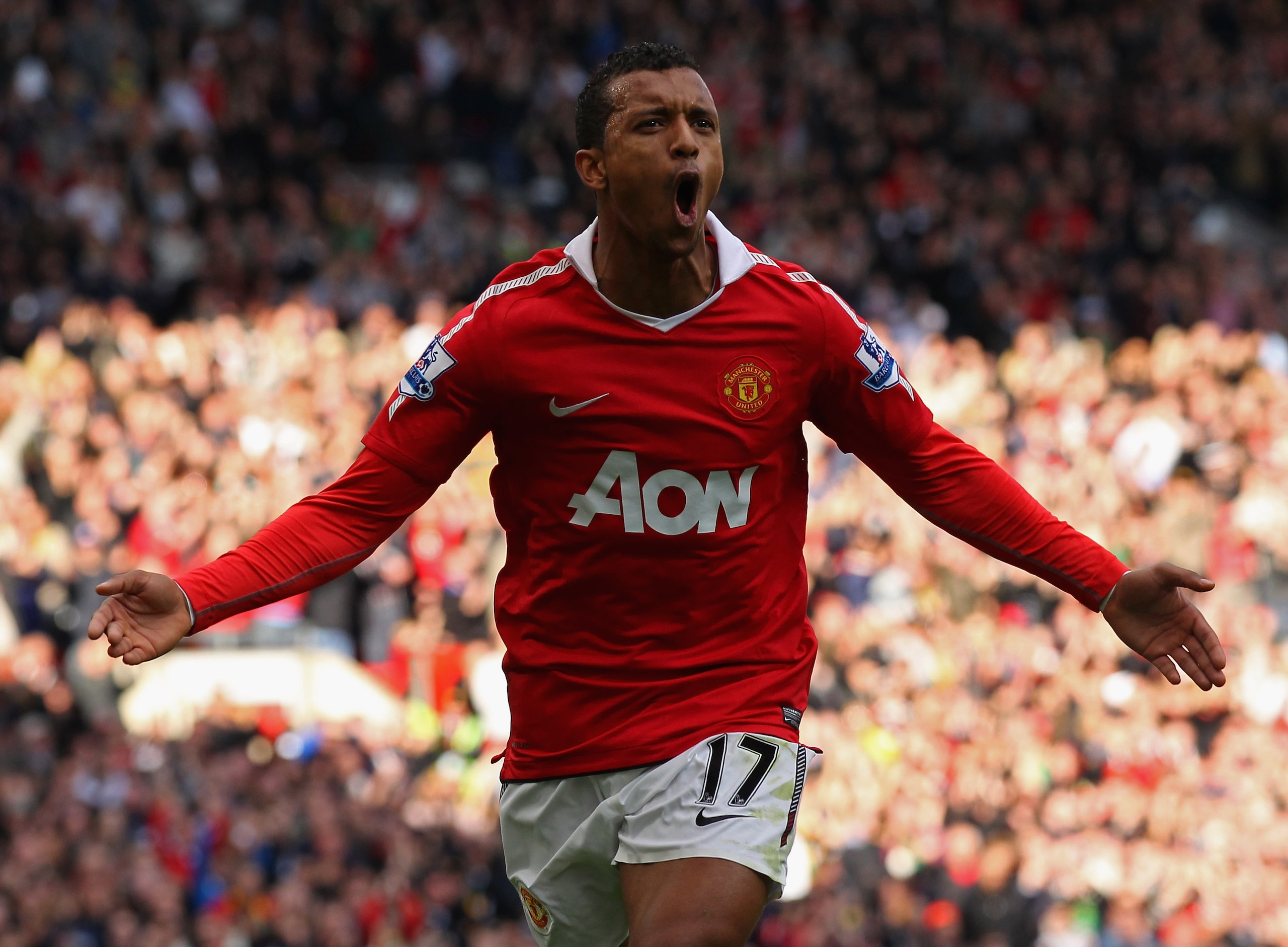 MANCHESTER, ENGLAND - OCTOBER 16:  Nani of Manchester United celebrates after scoring the second goal during the Barclays Premier League match between Manchester United and West Bromwich Albion at Old Trafford on October 16, 2010 in Manchester, England.  