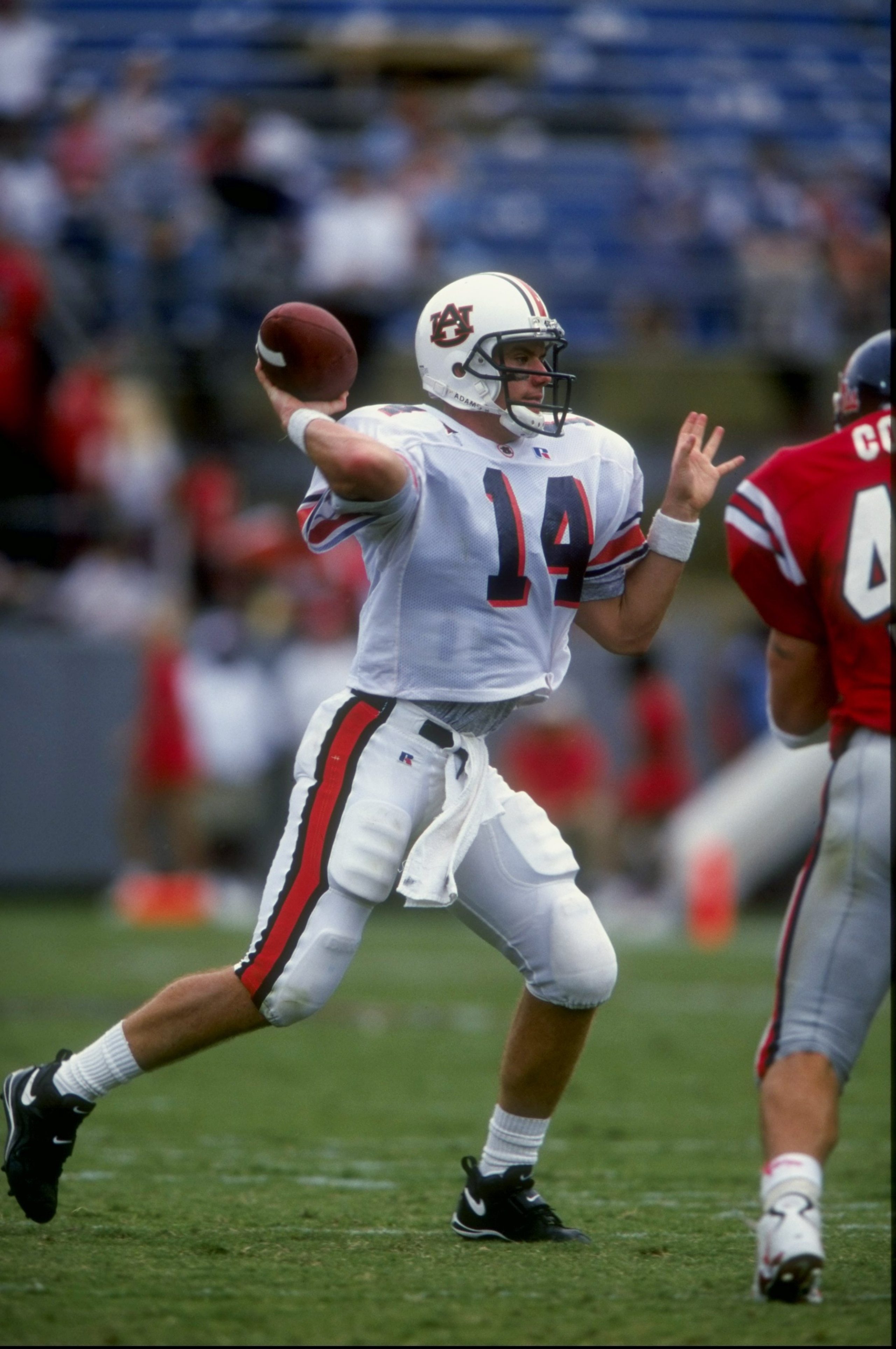 12 Sep 1998:  Quarterback Ben Leard #14 of the Auburn Tigers in action during a game against the Mississippi Rebels at the Hemingway Stadium in Oxford, Mississippi. The Tigers defeated the Rebels 17-0. Mandatory Credit: Todd Warshaw  /Allsport