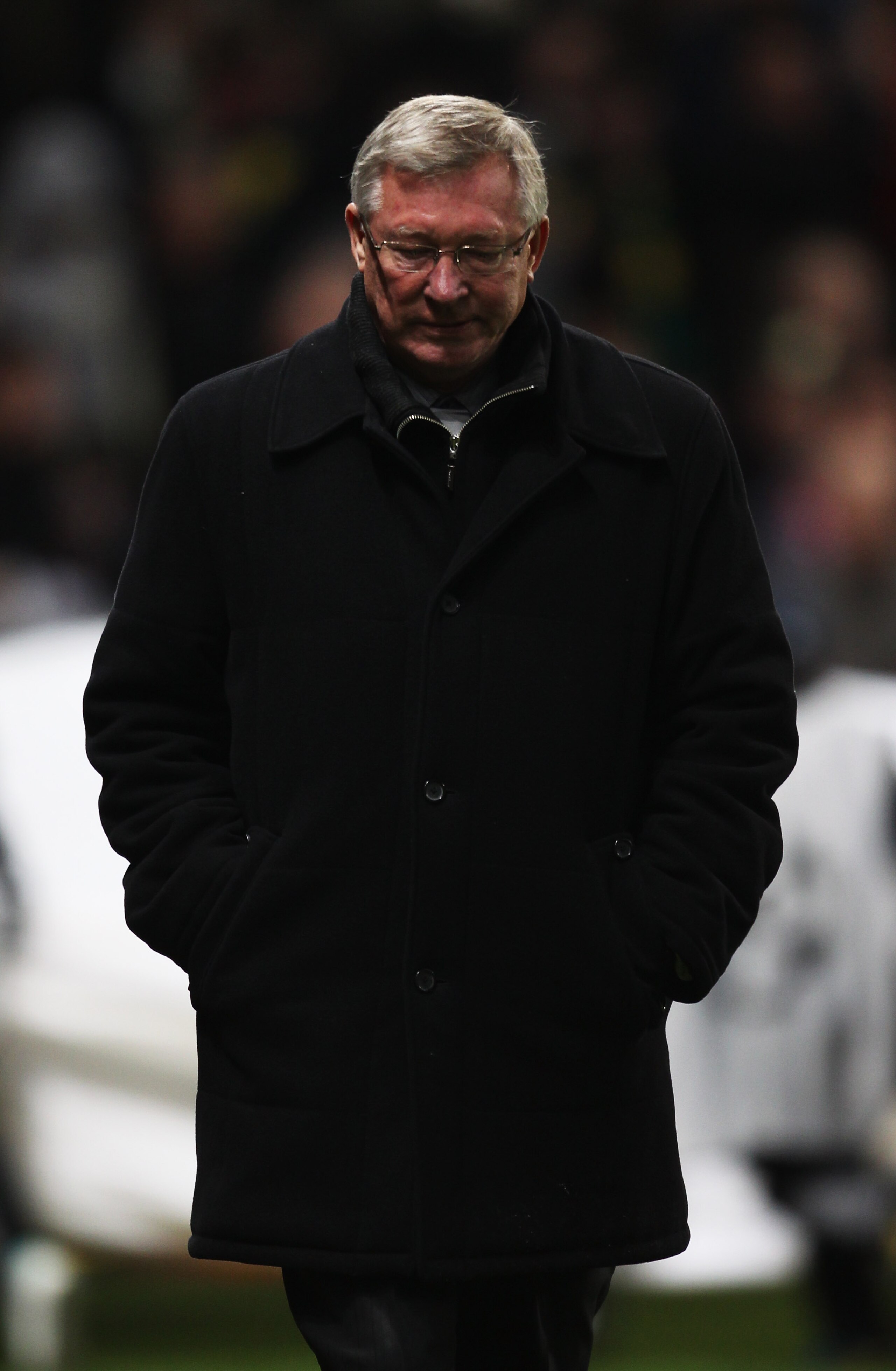 MANCHESTER, ENGLAND - OCTOBER 20:  Sir Alex Ferguson manager of Manchester United looks thoughtful as he walks to the bench prior to the UEFA Champions League Group C  match between Manchester United and Bursaspor Kulubu at Old Trafford on October 20, 201