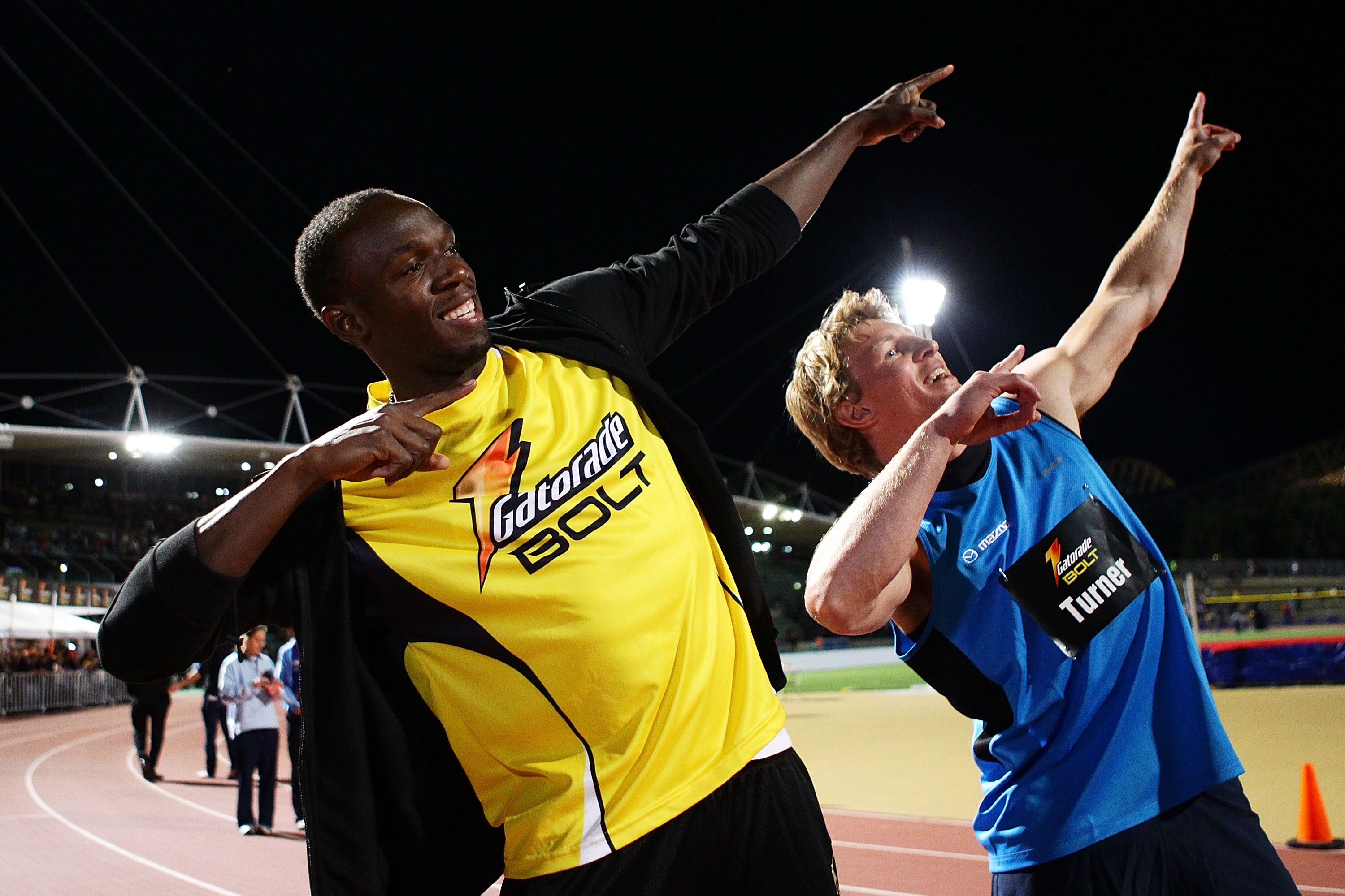 SYDNEY, AUSTRALIA - SEPTEMBER 15:  Usain Bolt of Jamaica (L) and Lachie Turner (R) pose after the 'Gatorage Bolt' during the Athletic Allstars Meet at Sydney Olympic Park Athletic Centre on September 15, 2010 in Sydney, Australia.  (Photo by Matt King/Get