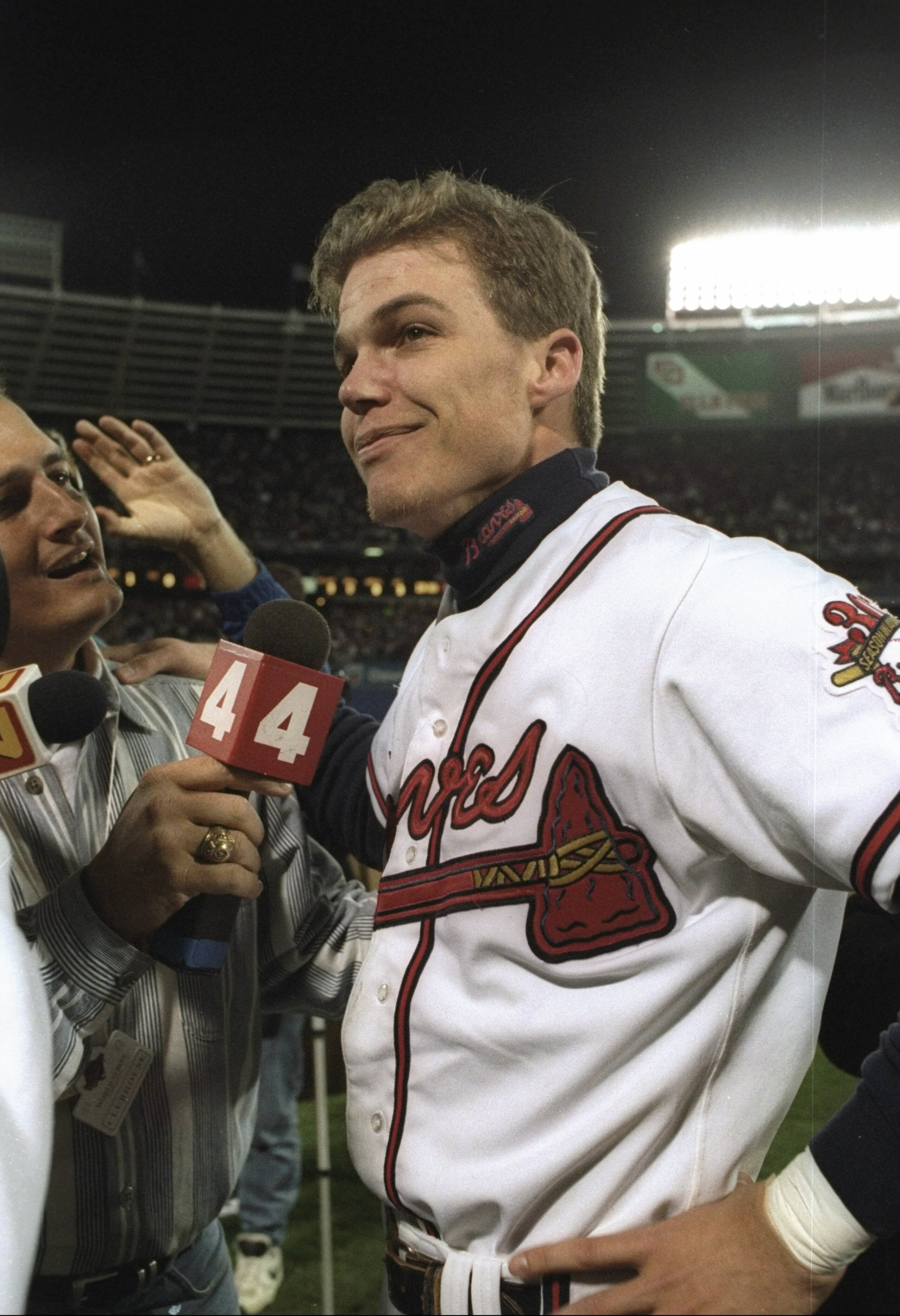 28 Oct 1995:  Third basemen Chipper Jones of the Atlanta Braves speaks with newsperson after winning game six of the World Series against the Cleveland Indians at Fulton County Stadium in Atlanta, Georgia.  The Braves won the game 1 - 0. Mandatory Credit: