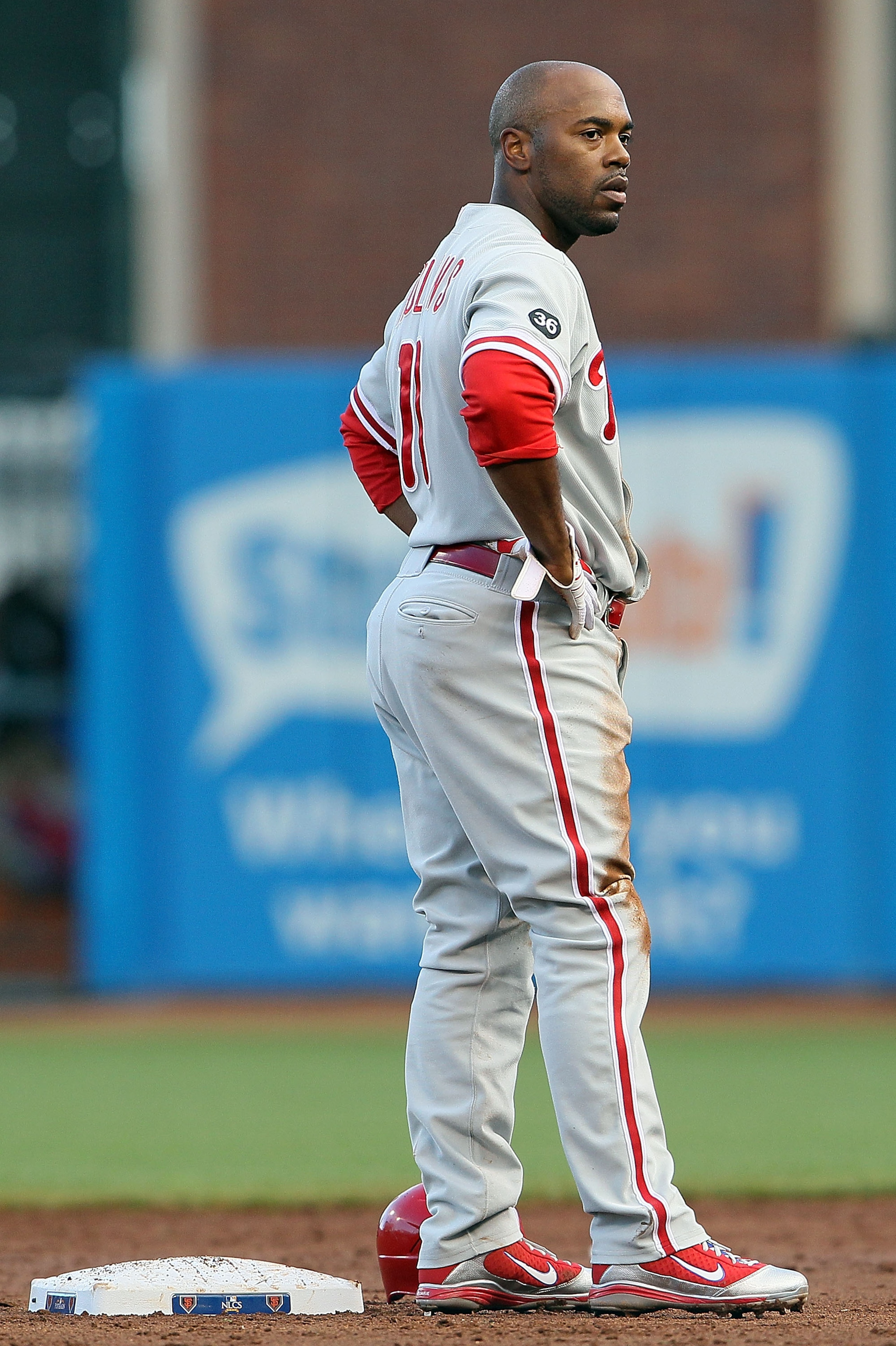 SAN FRANCISCO - OCTOBER 20:  Jimmy Rollins #11 of the Philadelphia Phillies stands at second base after being tagged out during Game Four of the NLCS against the San Francisco Giants in the 2010 MLB Playoffs at AT&T Park on October 20, 2010 in San Francis