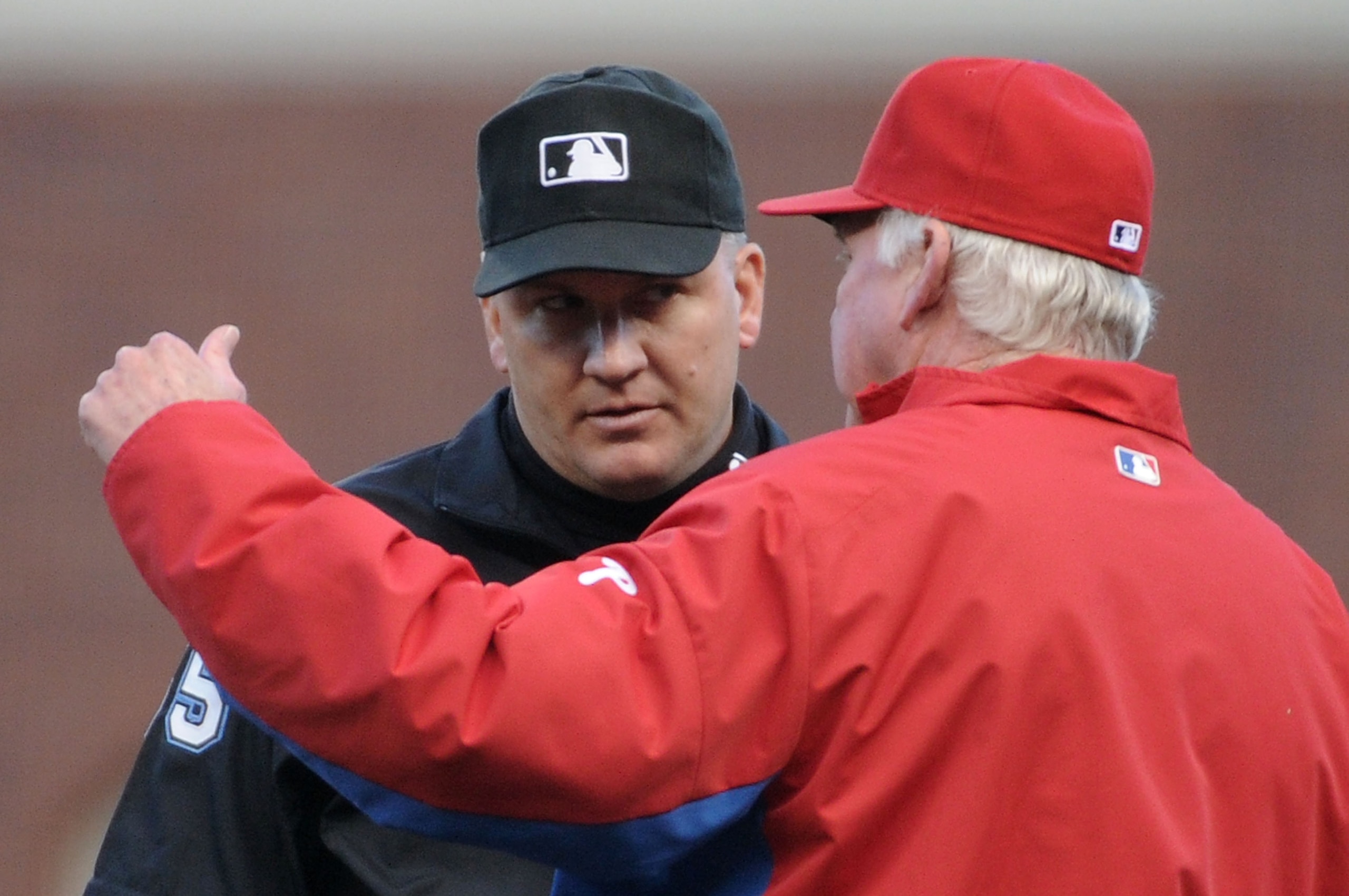 SAN FRANCISCO - OCTOBER 20:  Manager Charlie Manuel of the Philadelphia Phillies argues a call with umpire Jeff Nelson on the field in Game Four of the NLCS against the San Francisco Giants during the 2010 MLB Playoffs at AT&T Park on October 20, 2010 in