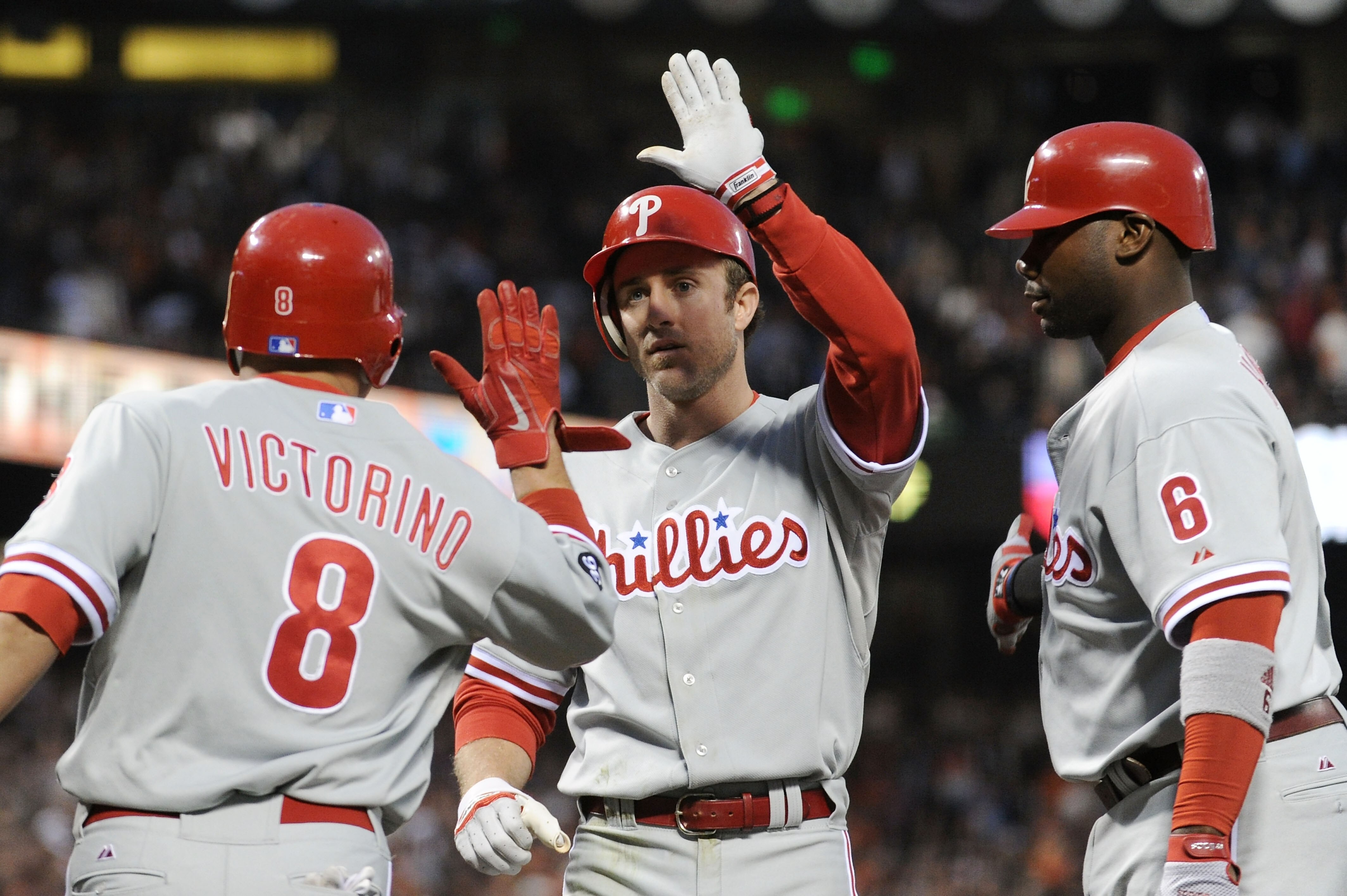 SAN FRANCISCO - OCTOBER 20: (L-R) Shane Victorino #8, Chase Utley #26, and Ryan Howard #6 of the Philadelphia Phillies celebrate after Victorino and Utley scored on a double by Placido Polanco #27 against the San Francisco Giants in Game Four of the NLCS SAN FRANCISCO - OCTOBER 20: (L-R) Shane Victorino #8, Chase Utley #26, and Ryan Howard #6 of the Philadelphia Phillies celebrate after Victorino and Utley scored on a double by Placido Polanco #27 against the San Francisco Giants in Game Four of the NLCS