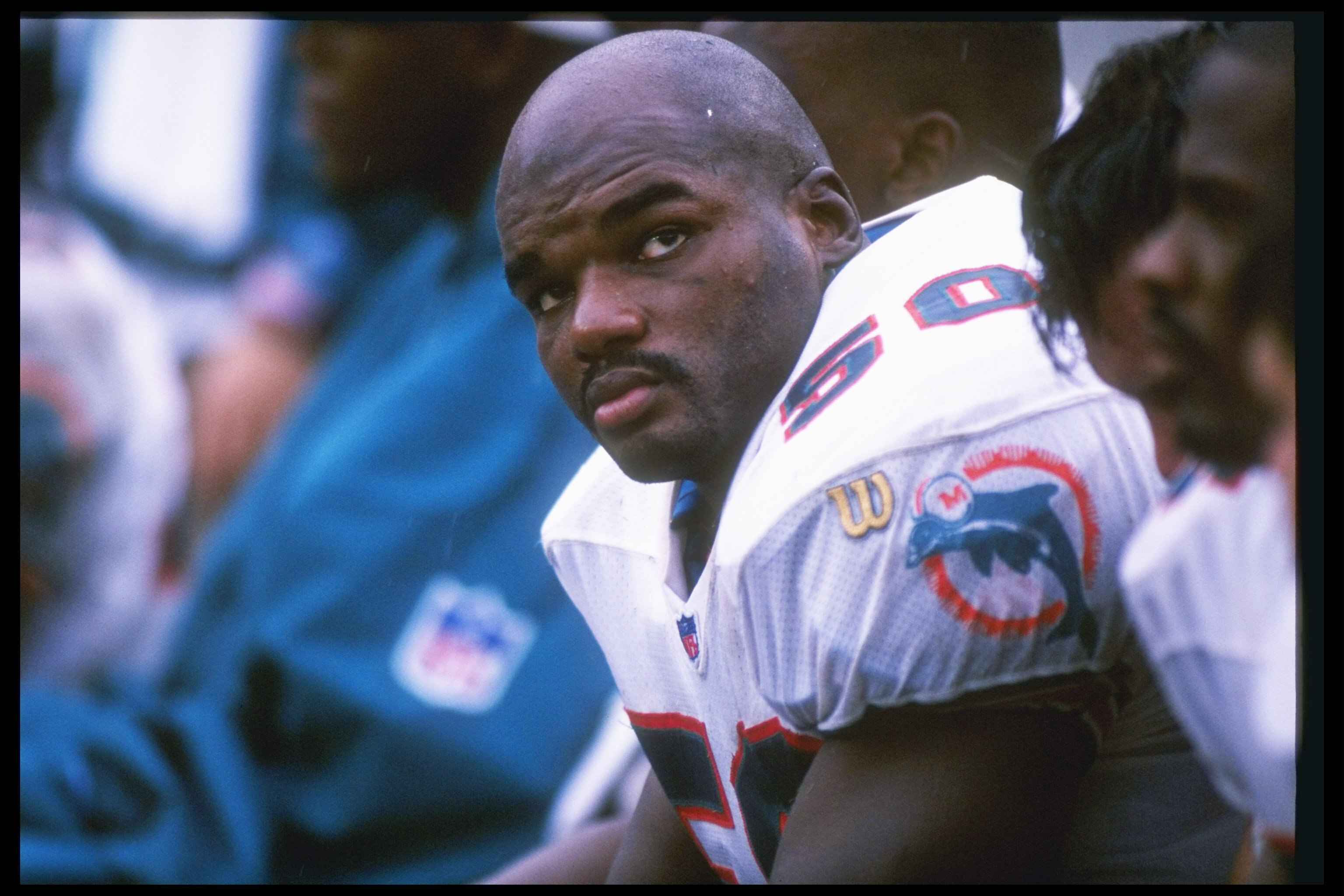 6 Oct 1996:  Linebacker Dwight Hollier of the Miami Dolphins sits on the bench during a game against the Seattle Seahawks at Pro Player Stadium in Miami, Florida.  The Seahawks won the game 22-15. Mandatory Credit: Andy Lyons  /Allsport