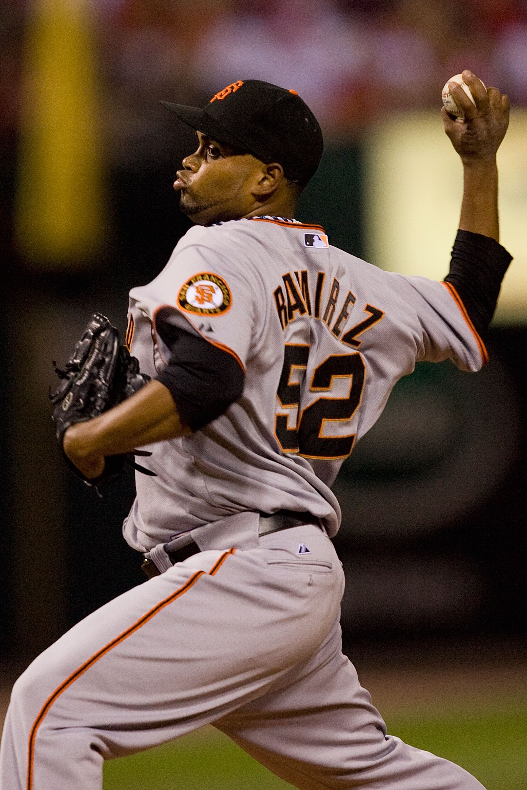 ST. LOUIS - AUGUST 21: Reliever Ramon Ramirez #52 of the San Francisco Giants pitches against the St. Louis Cardinals at Busch Stadium on August 21, 2010 in St. Louis, Missouri.  (Photo by Dilip Vishwanat/Getty Images)