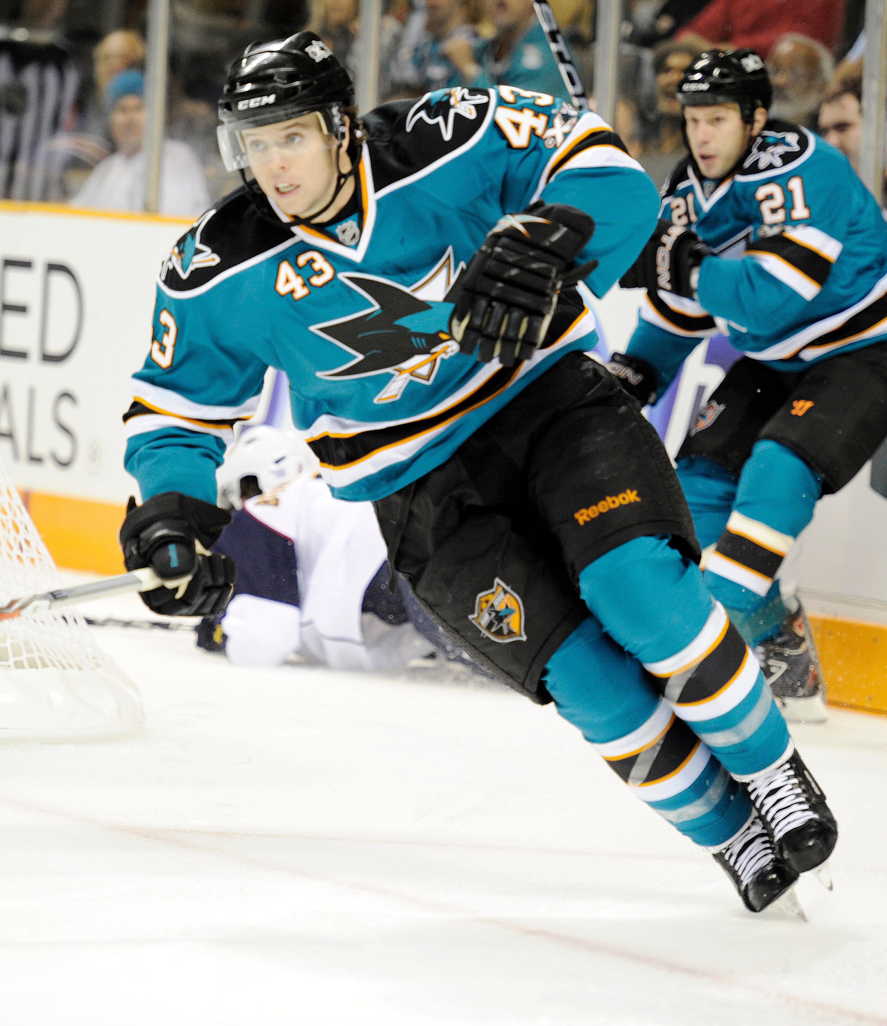 SAN JOSE, CA - OCTOBER 16: John McCarthy #43 of the San Jose Sharks skates skates up ice against the Atlanta Thrashers during an NHL hockey game at the HP Pavilion October 16, 2010 in San Jose, California. The Thrashers won the game 4-2. (Photo by Thearon