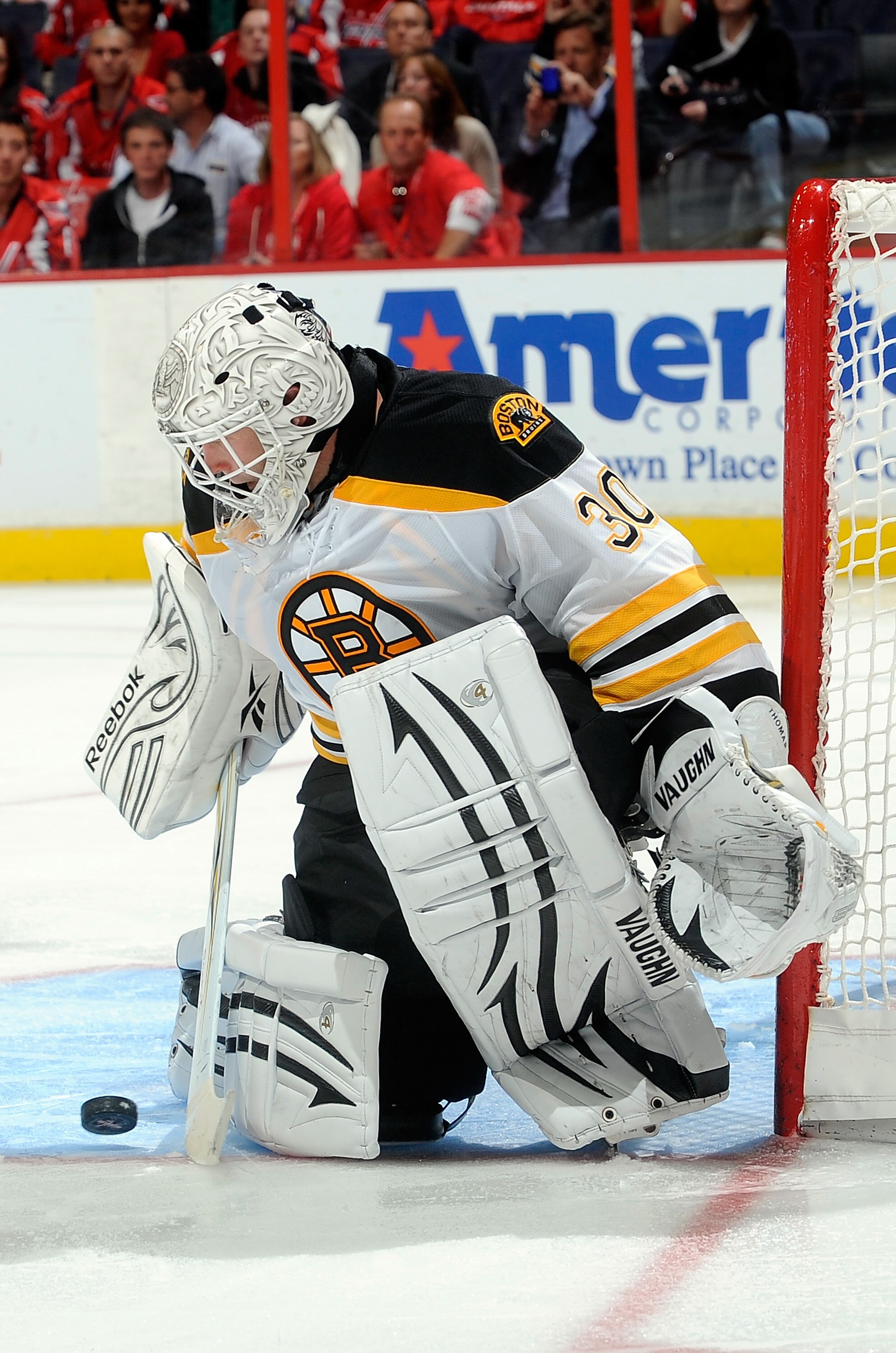 WASHINGTON - OCTOBER 19:  Tim Thomas #30 of the Boston Bruins makes a save against the Washington Capitals at the Verizon Center on October 19, 2010 in Washington, DC.  (Photo by Greg Fiume/Getty Images)
