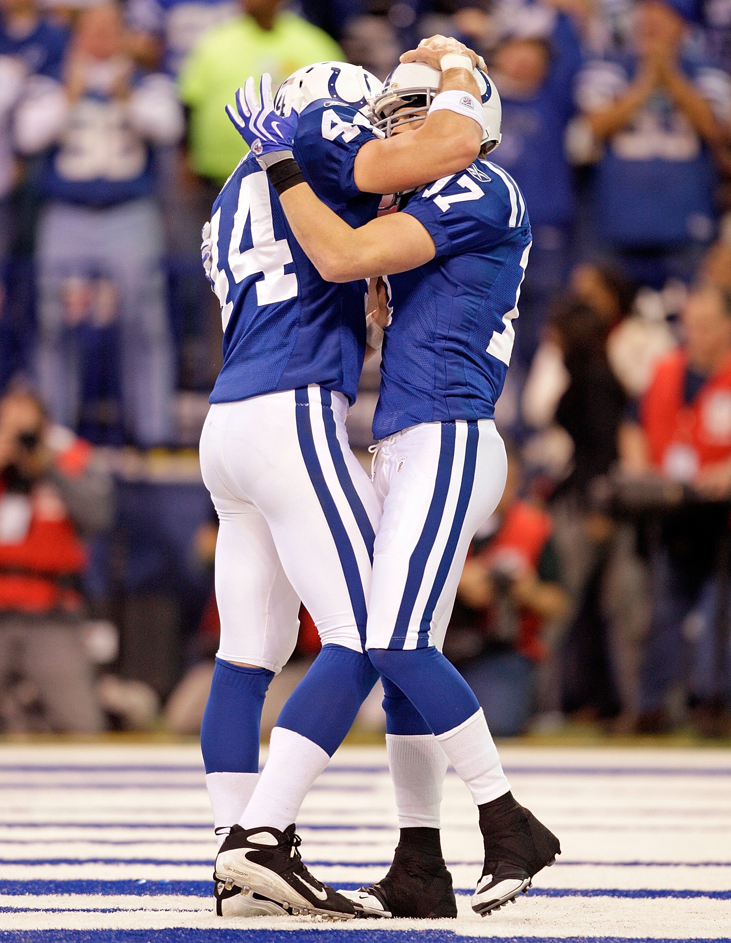 INDIANAPOLIS - DECEMBER 06:  Dallas Clark #44 and Austin Collie #17 of the Indianapolis Colts celebrate after Collie caught a touchdown pass during the NFL game against the Tennessee Titans at Lucas Oil Stadium on December 6, 2009 in Indianapolis, Indiana
