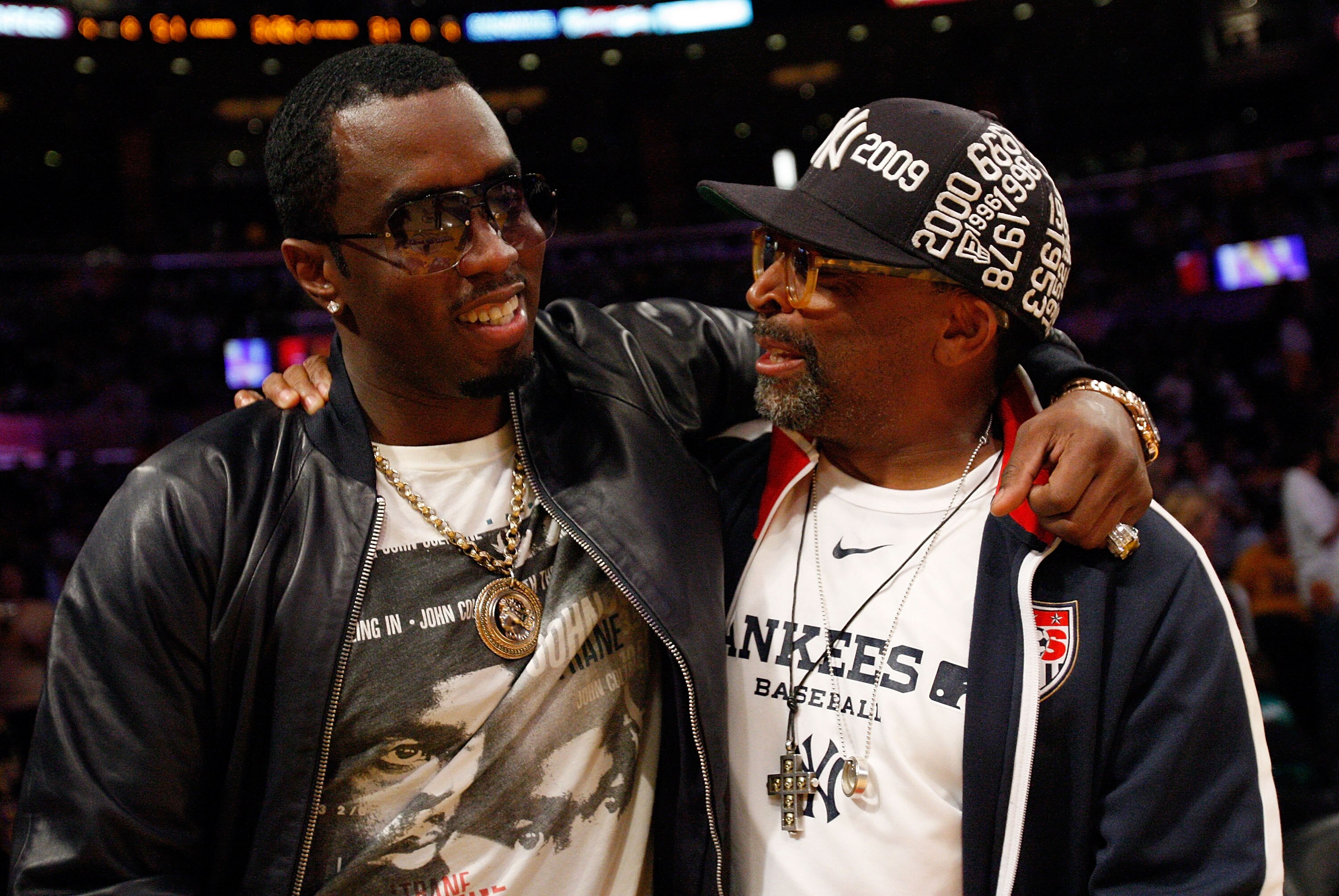 LOS ANGELES, CA - JUNE 15:  Sean 'Diddy' Combs and director Spike Lee talk during half time of Game Six of the 2010 NBA Finals between the Boston Celtics and the Los Angeles Lakers at Staples Center on June 15, 2010 in Los Angeles, California.  NOTE TO US