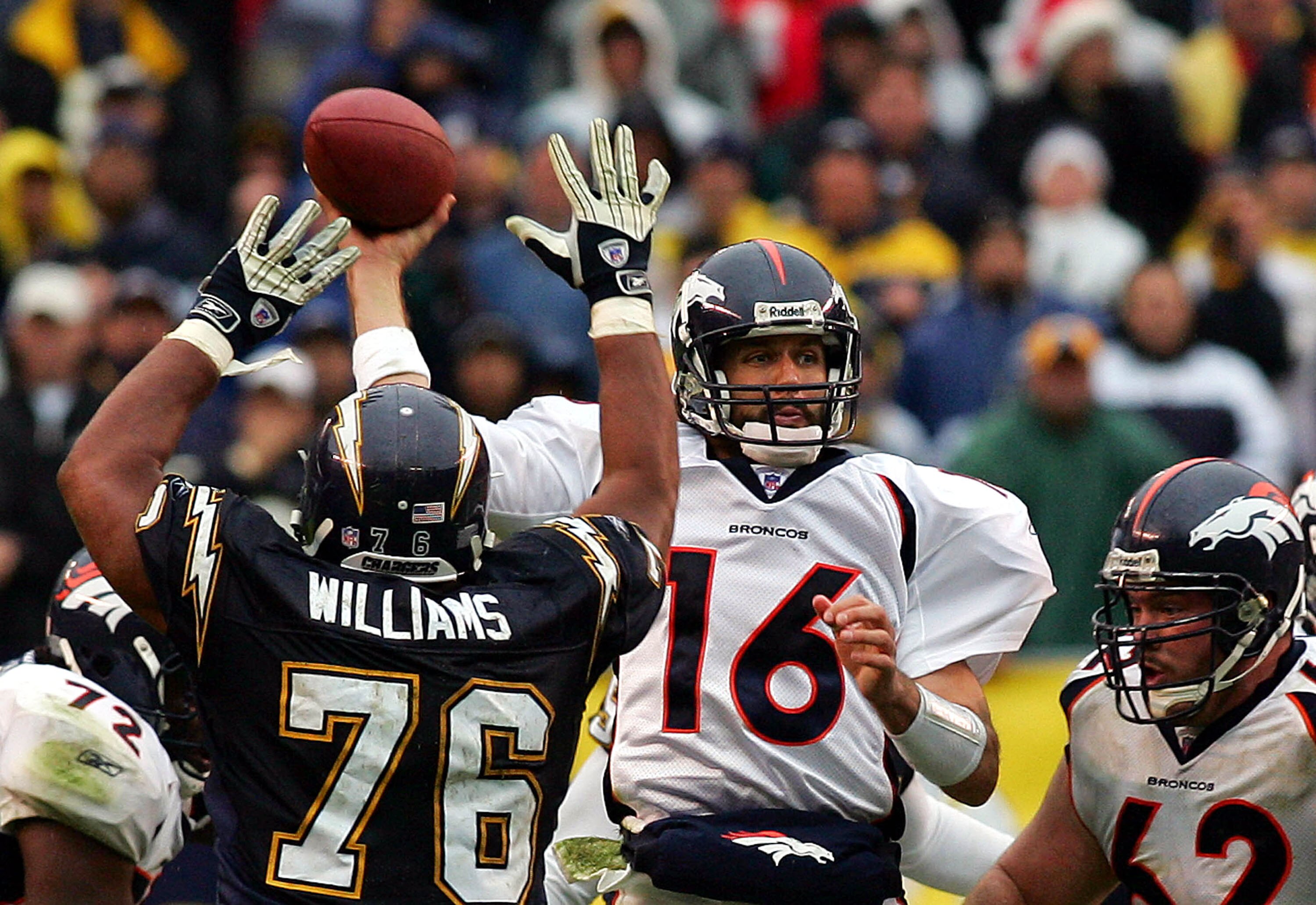 SAN DIEGO, CA - DECEMBER 5:  Linebacker Jamal Williams #76 of the San Diego Chargers pressures quarterback Jake Plummer #16 of the Denver Broncos during the Charger's 20-17 win over the Broncos during their NFL Game at Qualcomm Stadium on December 5, 2004