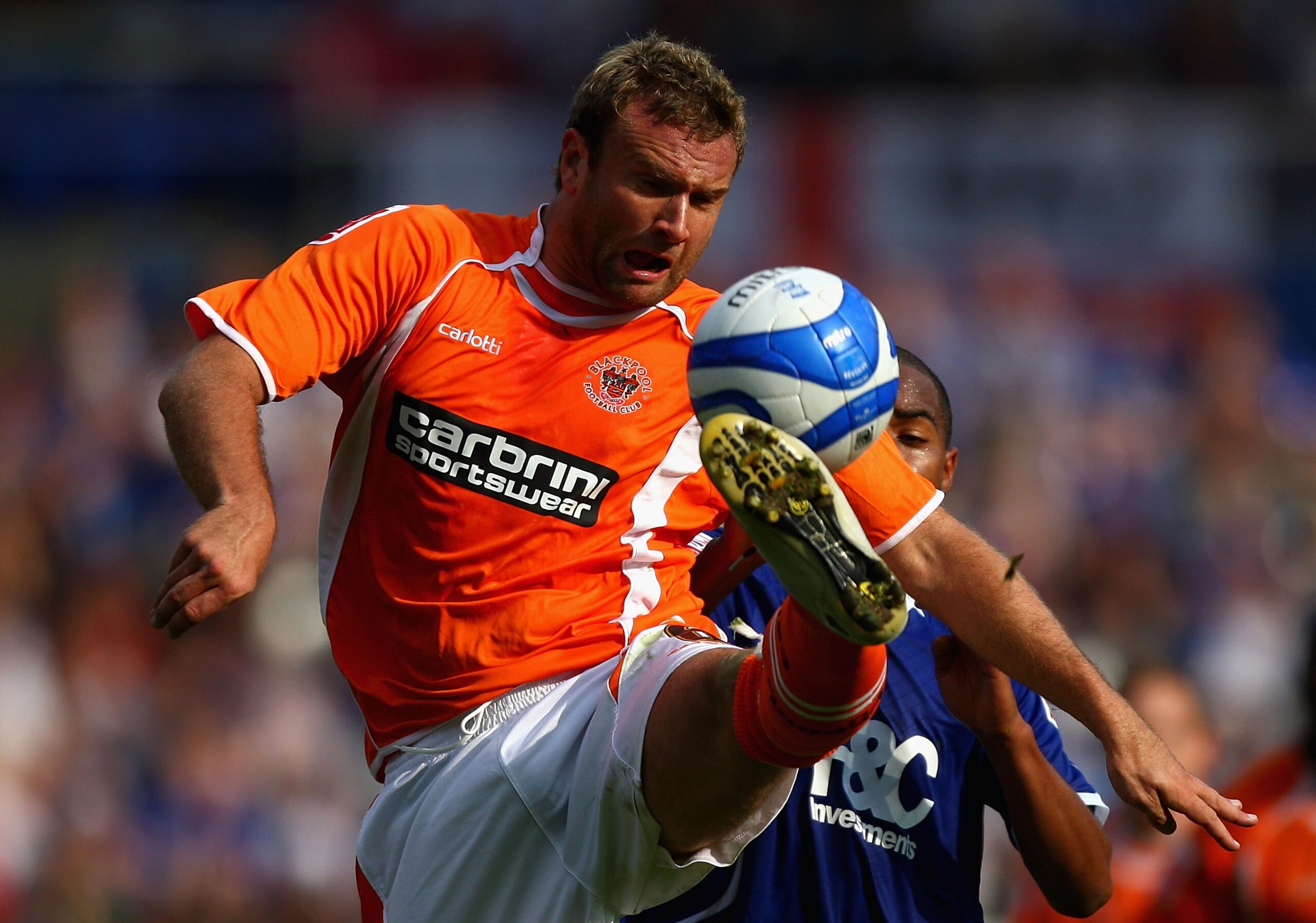 BIRMINGHAM, UNITED KINGDOM - SEPTEMBER 20: Ian Evatt of Blackpool clears the ball during the Coca Cola Championship match between Birmingham City and Blackpool at St Andrews on September 20, 2008 in Birmingham, England.  (Photo by Ryan Pierse/Getty Images