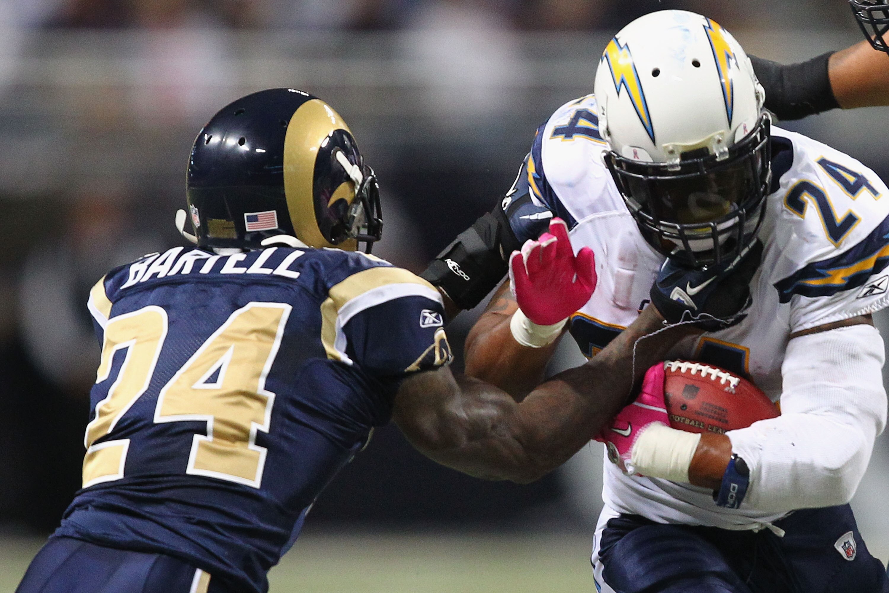 ST. LOUIS - OCTOBER 17: Ronald Bartell #24 of the St. Louis Rams tackles Ryan Mathews #24 of the San Diego Chargers at the Edward Jones Dome on October 17, 2010 in St. Louis, Missouri.  The Rams beat the Chargers 20-17.  (Photo by Dilip Vishwanat/Getty Im
