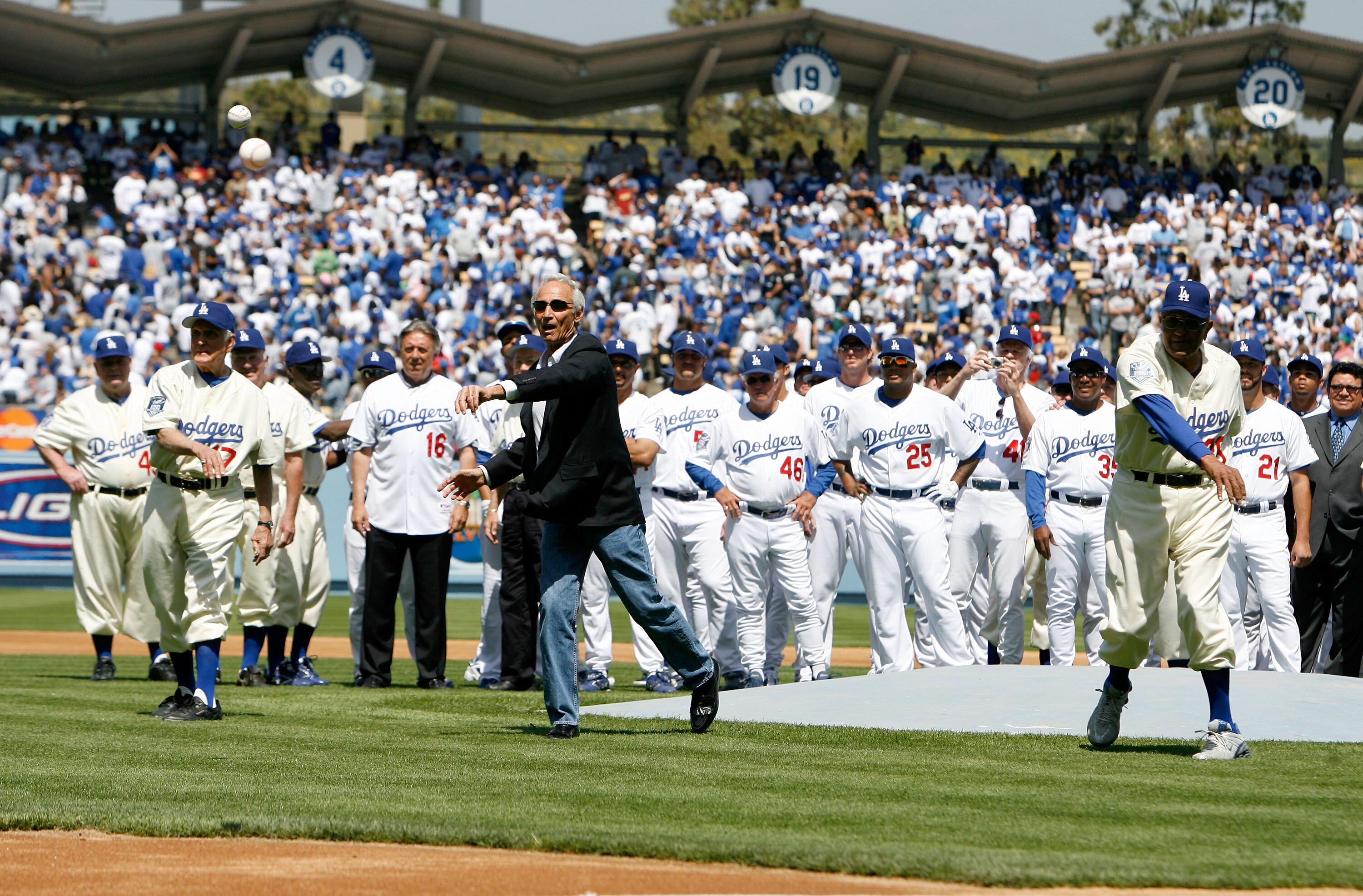 LOS ANGELES, CA - MARCH 31:  Former Dodgers Carl Erskine, Sandy Koufax, and Don Newcombe throw out the first pitch to start the Los Angeles Opening Day game against the San Francisco Giants at Dodger Stadium on March 31, 2008 in Los Angeles, California.  