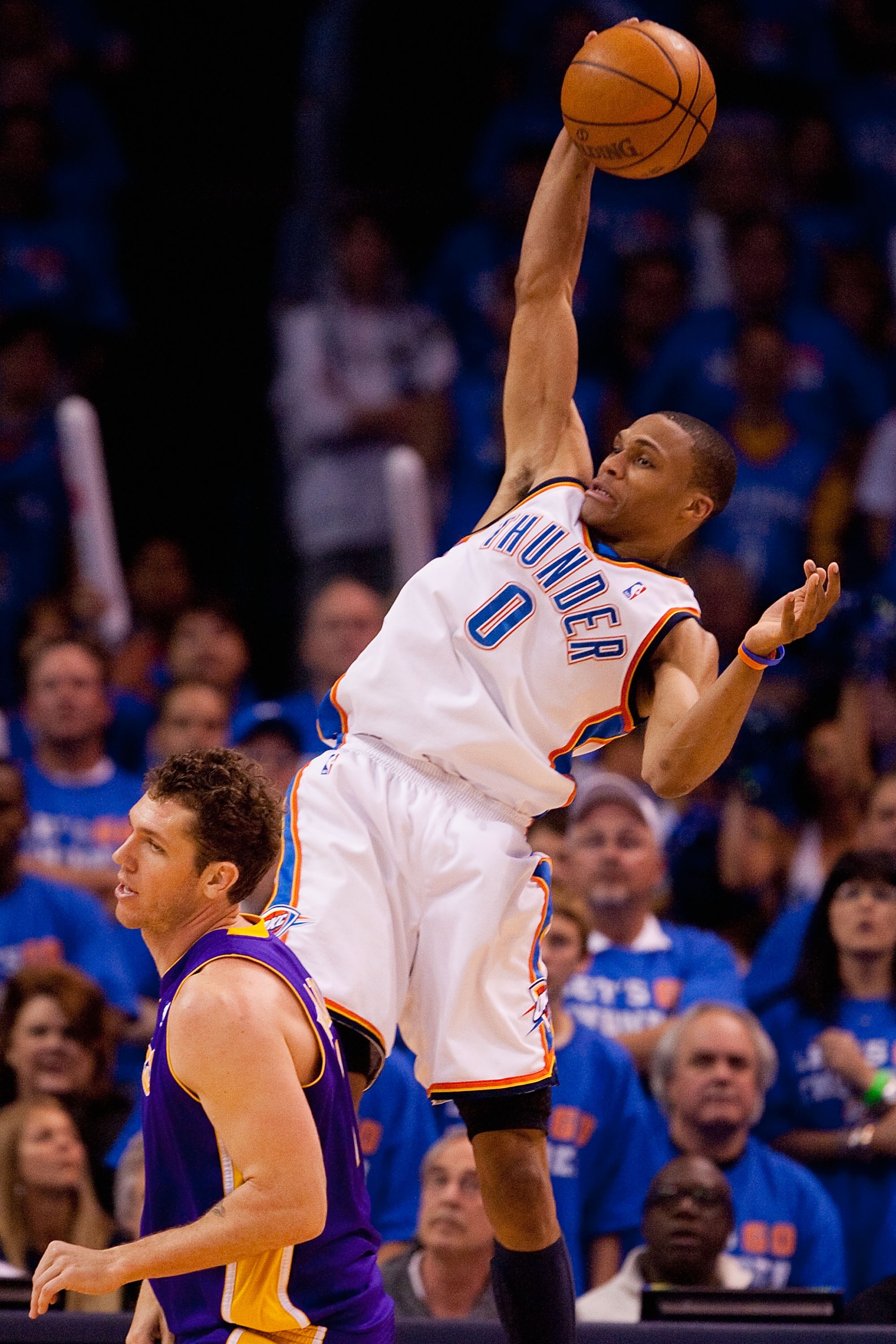 OKLAHOMA CITY - APRIL 30: Russell Westbrook #0 of the Oklahoma City Thunder pulls down a rebound against Luke Walton #4 of the Los Angeles Lakers during Game Six of the Western Conference Quarterfinals of the 2010 NBA Playoffs on April 30, 2010 at the For