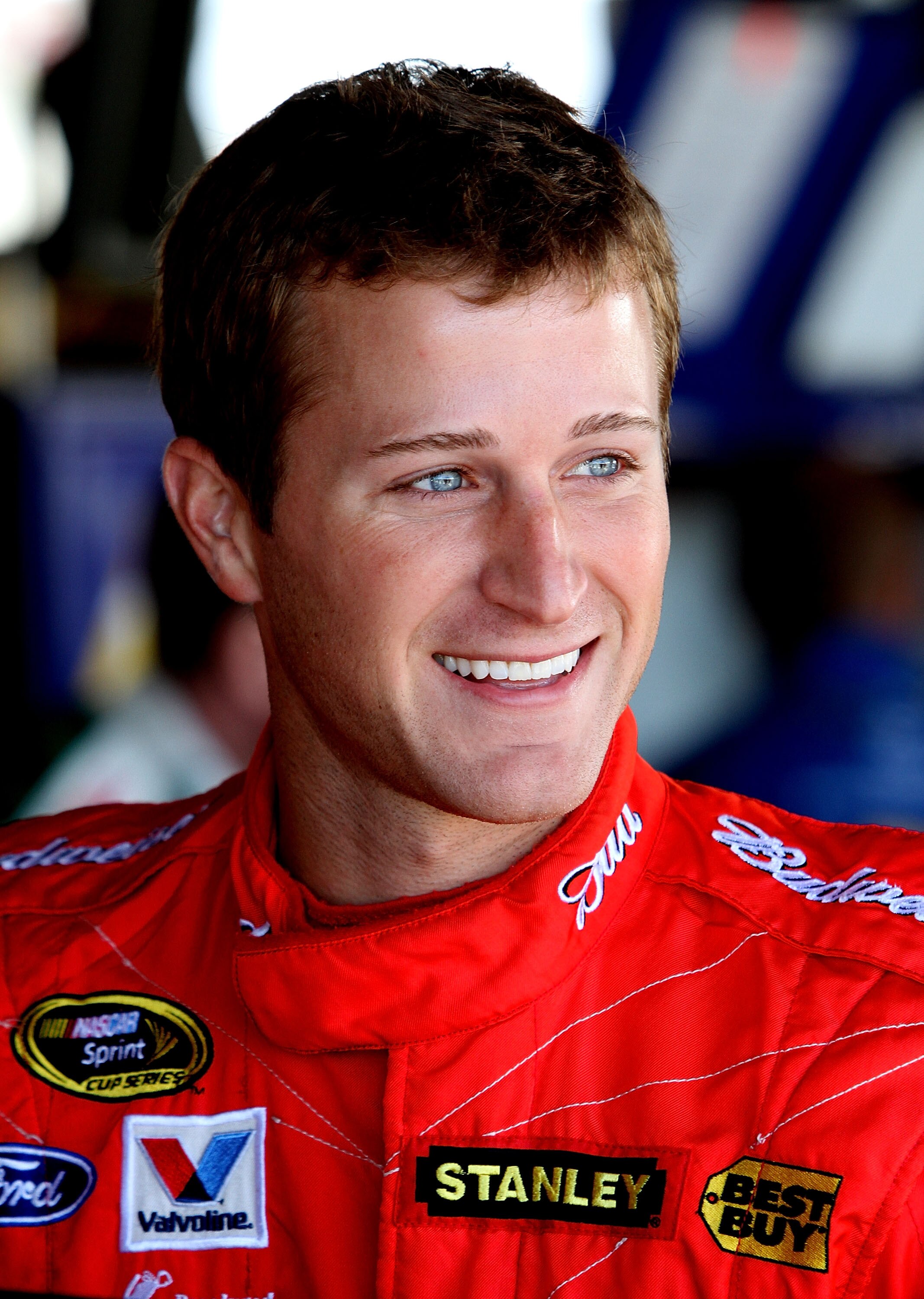 RICHMOND, VA - SEPTEMBER 10:  Kasey Kahne, driver of the #9 Budweiser Ford, stands in the garage during practice for the NASCAR Sprint Cup Series Air Guard 400 at Richmond International Raceway on September 10, 2010 in Richmond, Virginia.  (Photo by Jerry