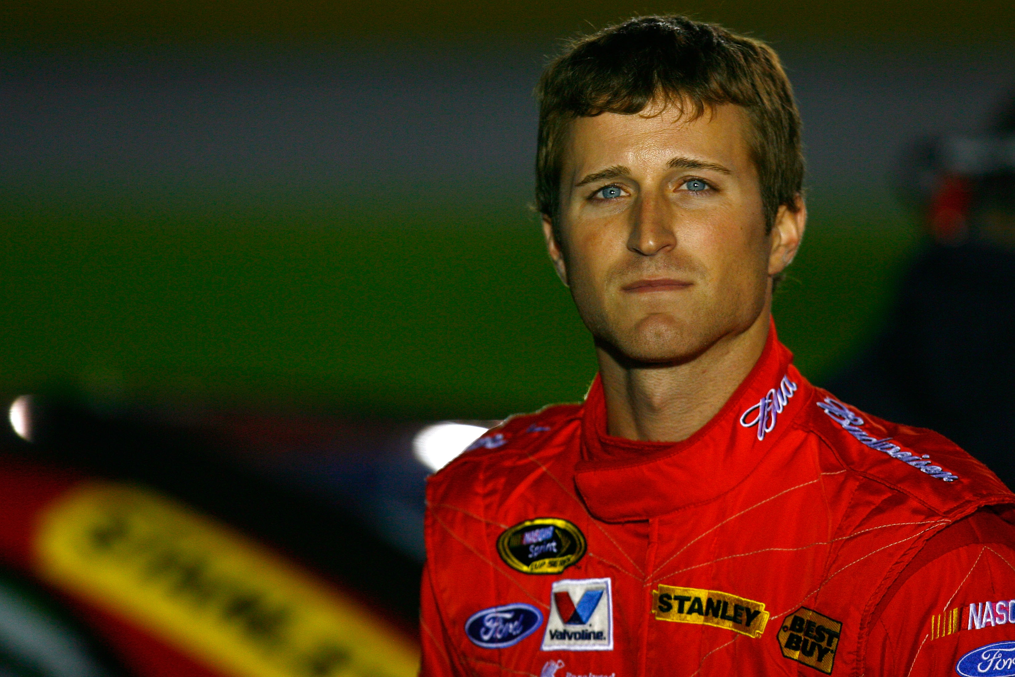 CONCORD, NC - OCTOBER 14:  Kasey Kahne, driver of the #9 Budweiser Ford, stands on the grid during qualifying for the NASCAR Sprint Cup Series Bank of America 500 at Charlotte Motor Speedway on October 14, 2010 in Concord, North Carolina.  (Photo by Jason