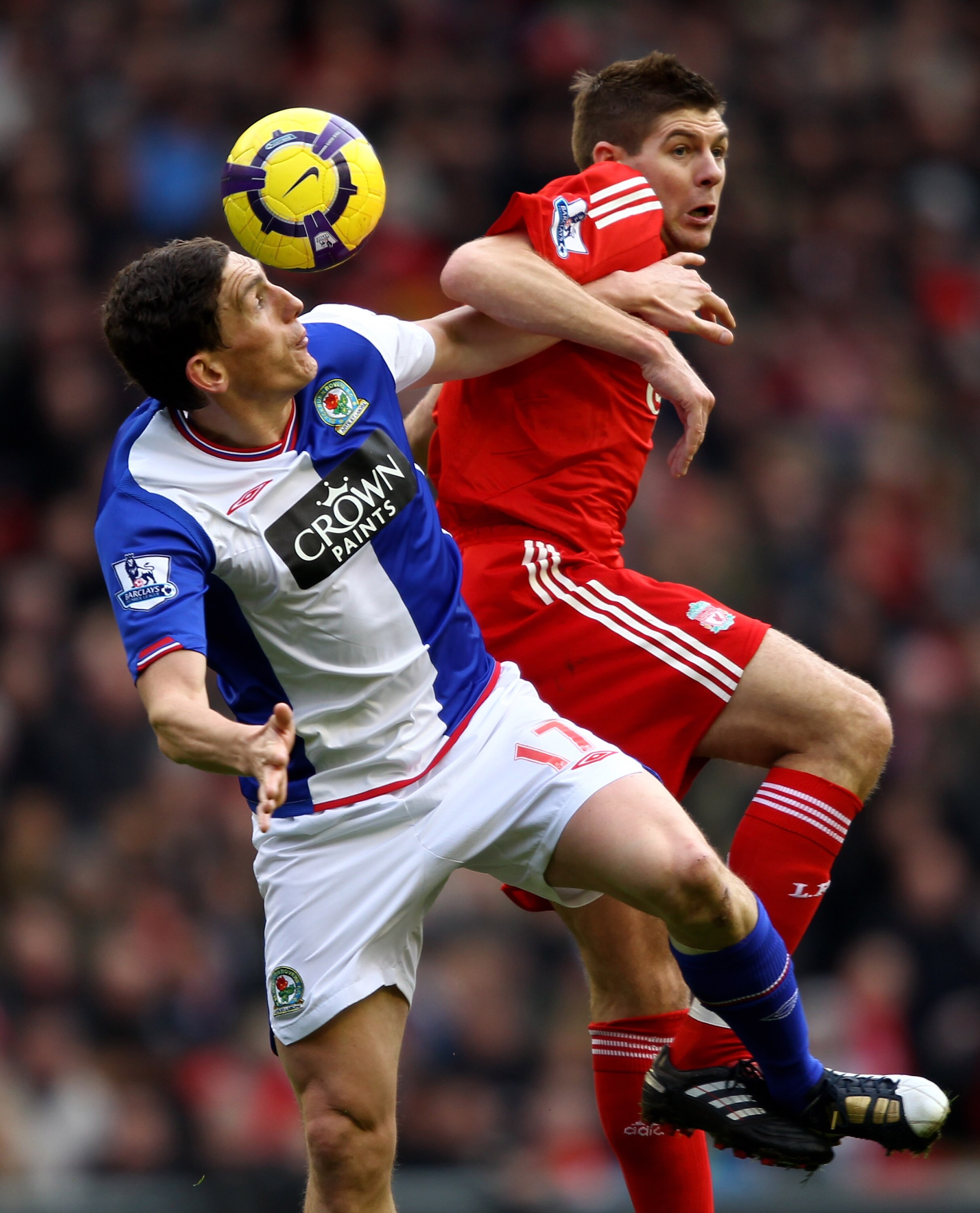 LIVERPOOL, ENGLAND - FEBRUARY 28:  Keith Andrews of Blackburn Rovers competes for the ball with Steven Gerrard of Liverpool during the Barclays Premier League match between Liverpool and Blackburn Rovers at Anfield on February 28, 2010 in Liverpool, Engla