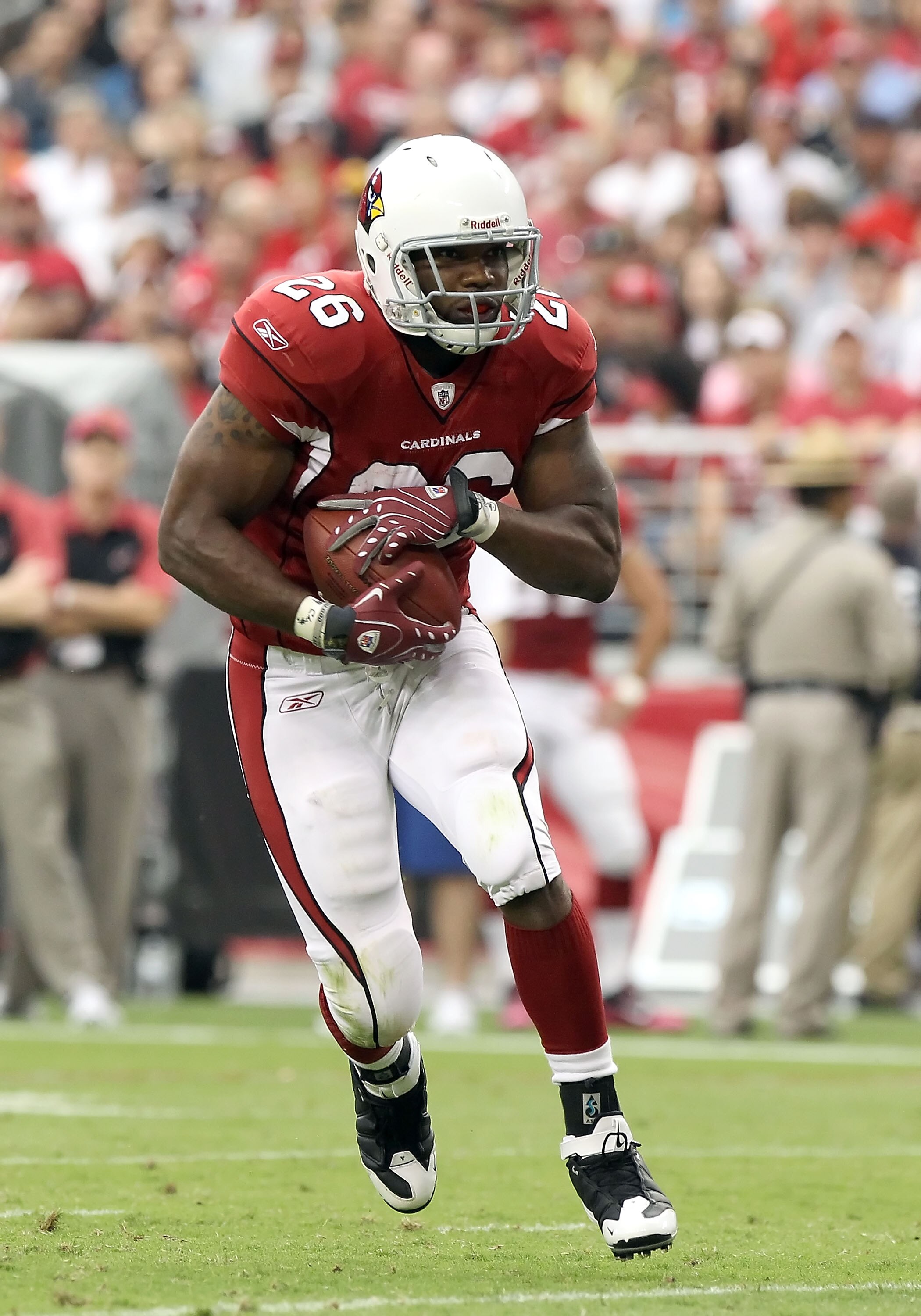 GLENDALE, AZ - OCTOBER 10:  Runningback Beanie Wells #26 of the Arizona Cardinals runs with the football during the NFL game against the New Orleans Saints at the University of Phoenix Stadium on October 10, 2010 in Glendale, Arizona. The Cardinals defeat