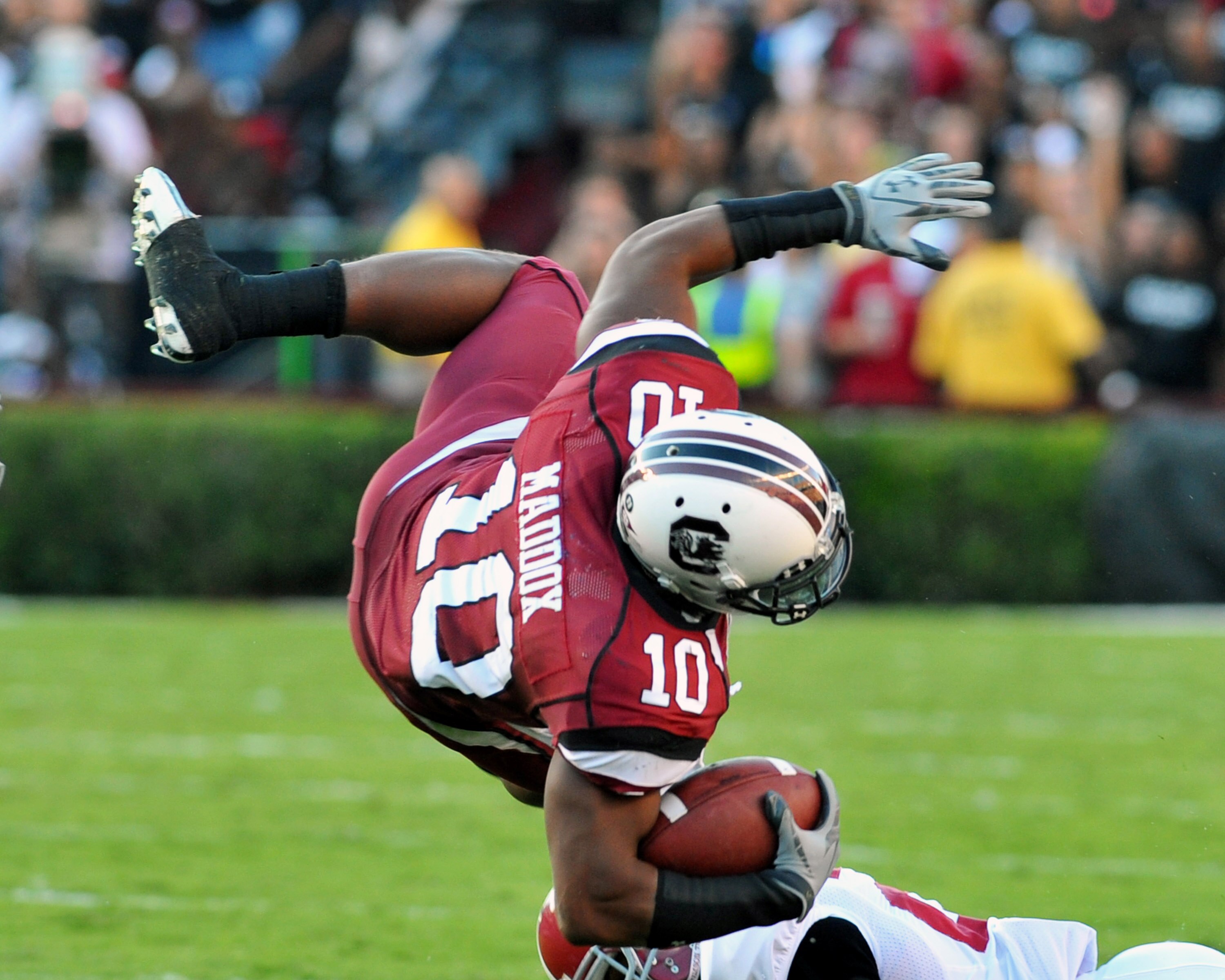COLUMBIA, SC - OCTOBER 9: Tailback Brian Maddox #10 of the South Carolina Gamecocks tumbles after a run for a gain against the Alabama Crimson Tide October 9, 2010 at Williams-Brice Stadium in Columbia, South Carolina. (Photo by Al Messerschmidt/Getty Im COLUMBIA, SC - OCTOBER 9: Tailback Brian Maddox #10 of the South Carolina Gamecocks tumbles after a run for a gain against the Alabama Crimson Tide October 9, 2010 at Williams-Brice Stadium in Columbia, South Carolina. (Photo by Al Messerschmidt/Getty Im