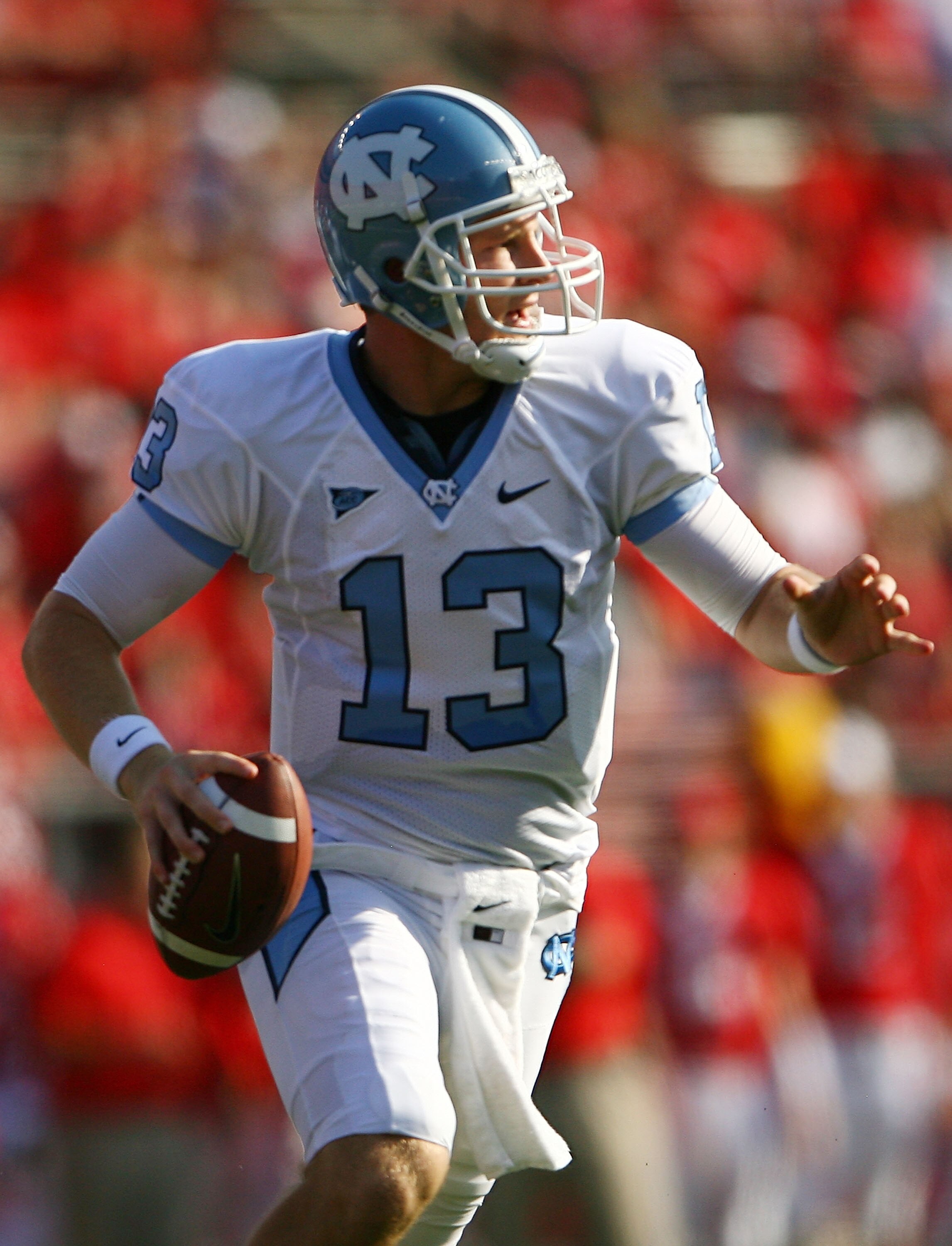 NEW BRUNSWICK, NJ - SEPTEMBER 25: T.J. Yates #13 of the North Carolina Tar Heels drops back against the Rutgers Scarlet Knights at Rutgers Stadium on September 25, 2010 in New Brunswick, New Jersey. (Photo by Andrew Burton/Getty Images) NEW BRUNSWICK, NJ - SEPTEMBER 25: T.J. Yates #13 of the North Carolina Tar Heels drops back against the Rutgers Scarlet Knights at Rutgers Stadium on September 25, 2010 in New Brunswick, New Jersey. (Photo by Andrew Burton/Getty Images)