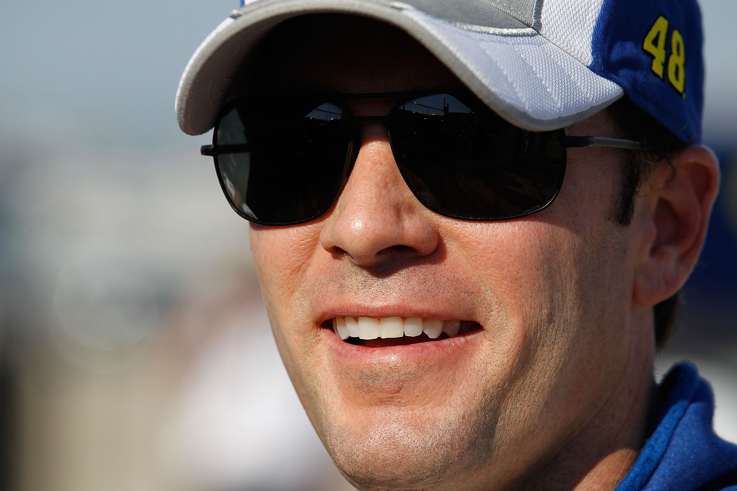 JOLIET, IL - JULY 09: Jimmy Johnson, driver of the #48 Lowe's Chevrolet, smiles after qualifying for the NASCAR Sprint Cup Series LIFELOCK.COM 400 at the Chicagoland Speedway on July 9, 2010 in Joliet, Illinois. (Photo by Jonathan Daniel/Getty Images)