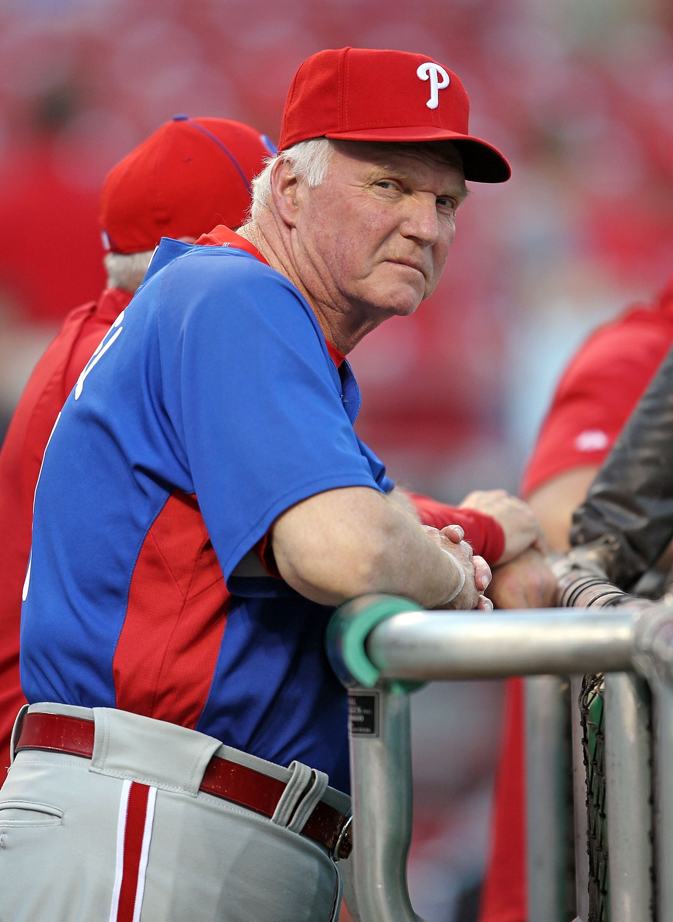 CINCINNATI - OCTOBER 10:  Charlie Manuel the manager of the Philadelphia Phillies watches batting practice before the start of Game 3 of the NLDS against the Cincinnati Reds at Great American Ball Park on October 10, 2010 in Cincinnati, Ohio.  (Photo by A