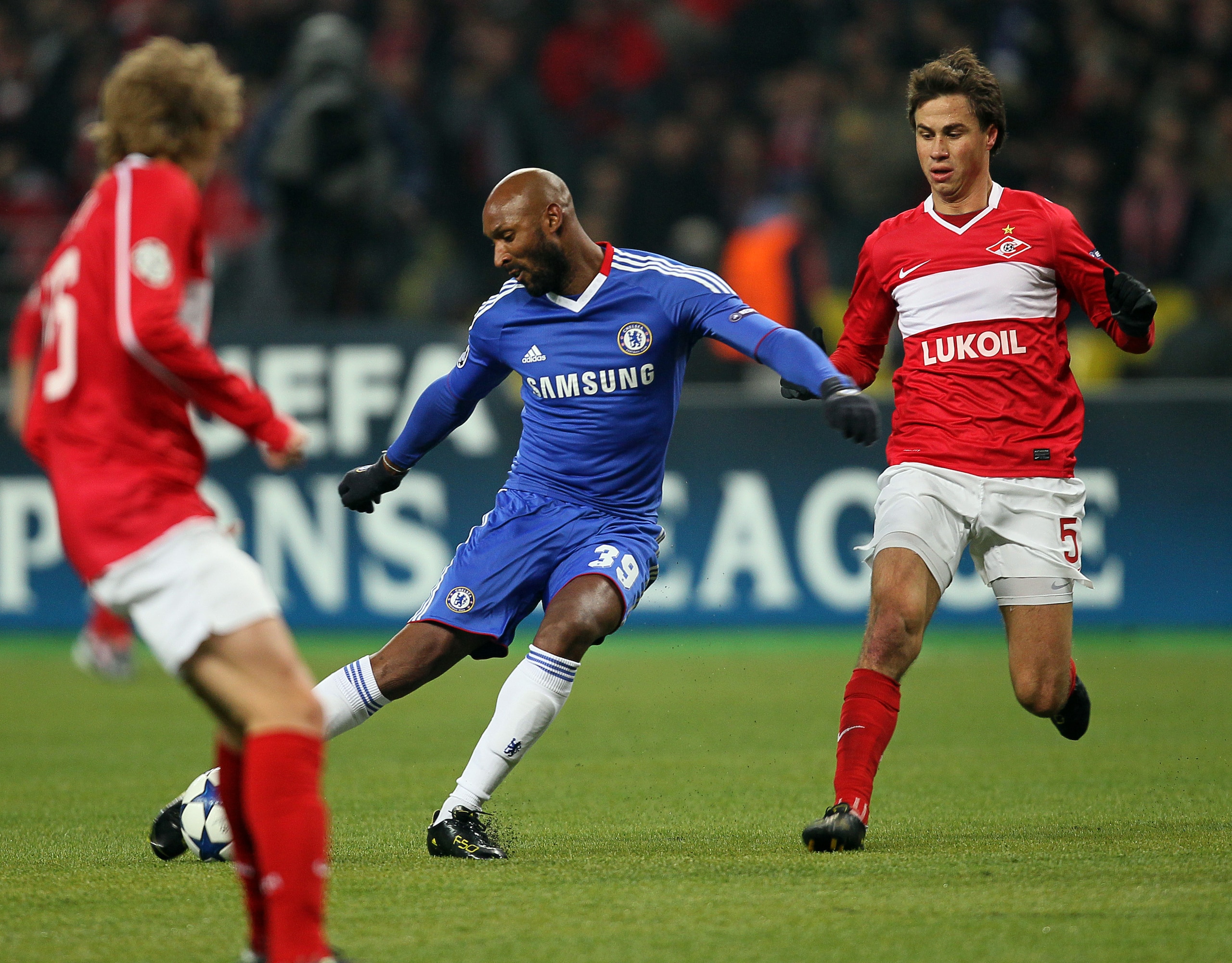MOSCOW, RUSSIA - OCTOBER 19: Aleksandr Sheshukov (R) of FC Spartak Moscow battles for the ball with Nicolas Anelka of Chelsea during the UEFA Champions League Group F match between FC Spartak Moscow and Chelsea at the Luzhniki Stadium on October 19, 201 MOSCOW, RUSSIA - OCTOBER 19: Aleksandr Sheshukov (R) of FC Spartak Moscow battles for the ball with Nicolas Anelka of Chelsea during the UEFA Champions League Group F match between FC Spartak Moscow and Chelsea at the Luzhniki Stadium on October 19, 201