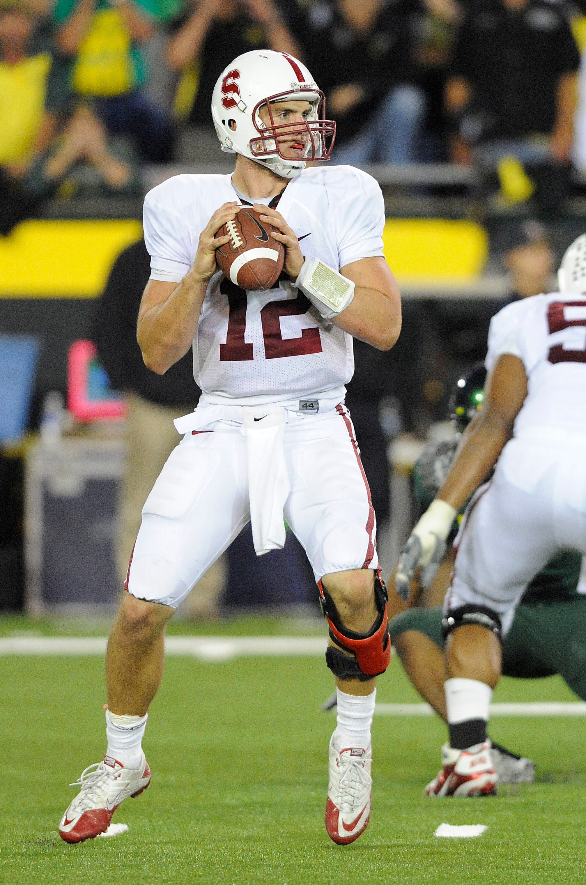 EUGENE, OR - OCTOBER 2: Quarterback Andrew Luck #12 of the Stanford Cardinal looks for an open receiver in the third quarter of the game against the Oregon Ducks at Autzen Stadium on October 2, 2010 in Eugene, Oregon. Oregon won the game 52-31. (Photo by