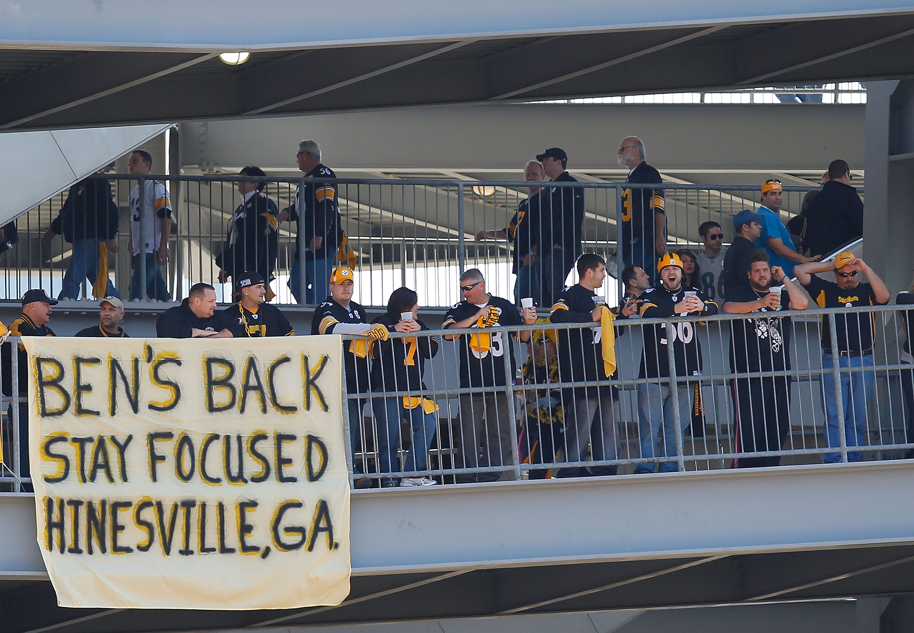 PITTSBURGH - OCTOBER 17:  Fans stand on the rotunda of Heinz Field next to a sign marking the return of Ben Roethlisberger #7 of the Pittsburgh Steelers during the game against the Cleveland Browns on October 17, 2010 at Heinz Field in Pittsburgh, Pennsyl