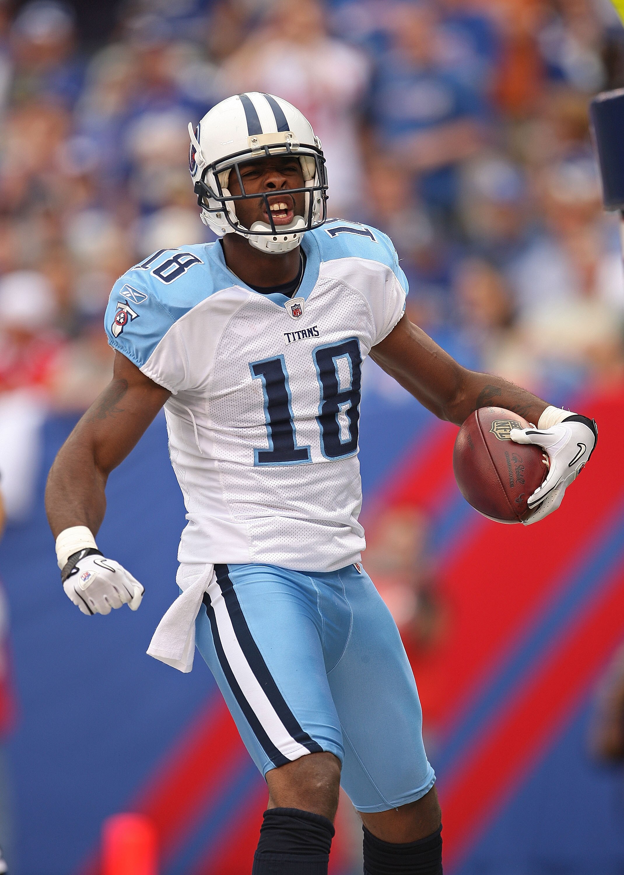 EAST RUTHERFORD, NJ - SEPTEMBER 26:  Kenny Britt #18 of the Tennessee Titans scores a second half touchdown during a game against the New York Giants at New Meadowlands Stadium on September 26, 2010 in East Rutherford, New Jersey.  (Photo by Mike Ehrmann/