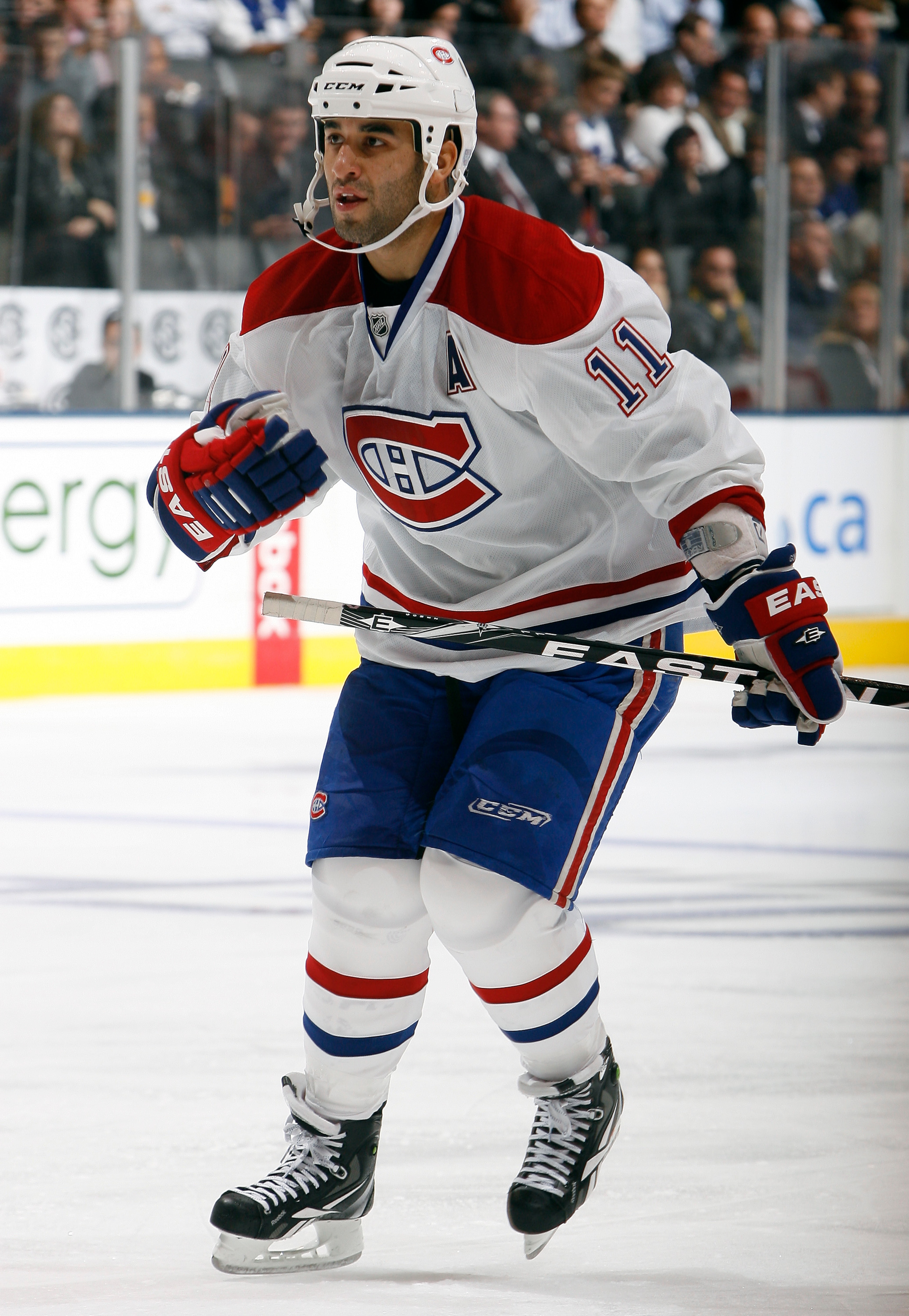 TORONTO, CANADA - OCTOBER 07: Scott Gomez #11 of the Montreal Canadiens skates up the ice during a regular season NHL game against the Toronto Maple Leafs at the Air Canada Centre October 7, 2010 in Toronto, Ontario, Canada. (Photo by Abelimages/Getty Ima TORONTO, CANADA - OCTOBER 07: Scott Gomez #11 of the Montreal Canadiens skates up the ice during a regular season NHL game against the Toronto Maple Leafs at the Air Canada Centre October 7, 2010 in Toronto, Ontario, Canada. (Photo by Abelimages/Getty Ima