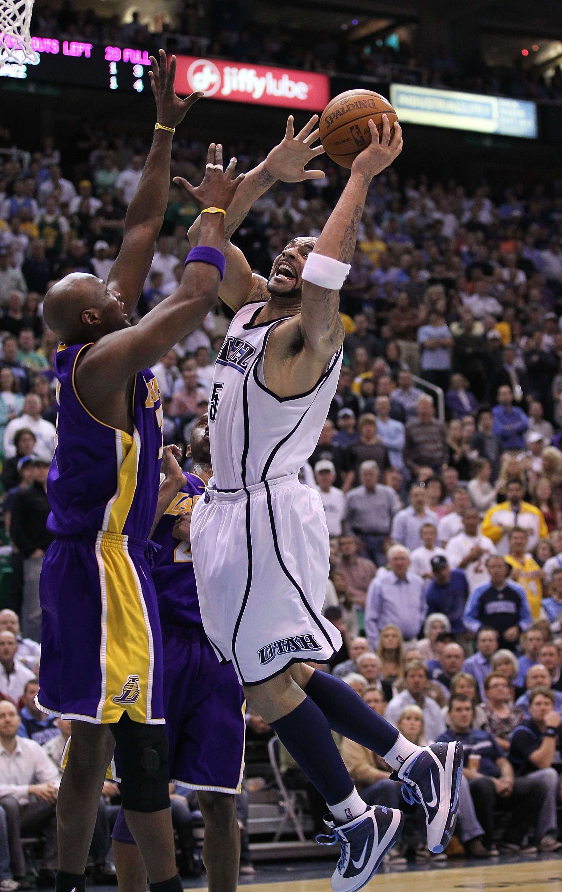 SALT LAKE CITY - MAY 10:  Carlos Boozer #5 of the Utah Jazz shoots against the Los Angeles Lakers during Game Four of the Western Conference Semifinals of the 2010 NBA Playoffs on May 10, 2010 at Energy Solutions Arena in Salt Lake City, Utah. NOTE TO USE