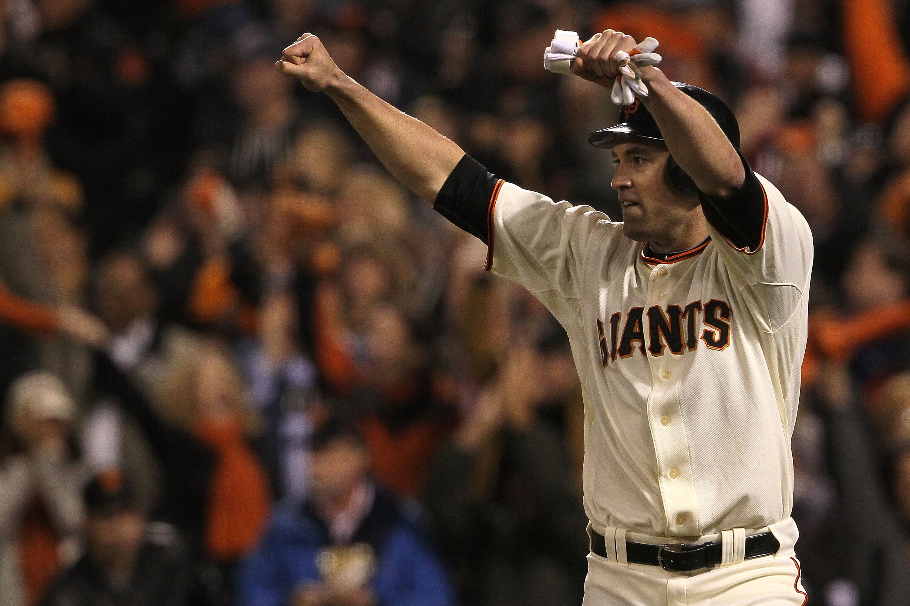 SAN FRANCISCO - OCTOBER 20:  Pat Burrell #9 of the San Francisco Giants celebrates after scoring on a double by Pablo Sandoval #48 in the sixth inning of Game Four of the NLCS during the 2010 MLB Playoffs at AT&T Park on October 20, 2010 in San Francisco,