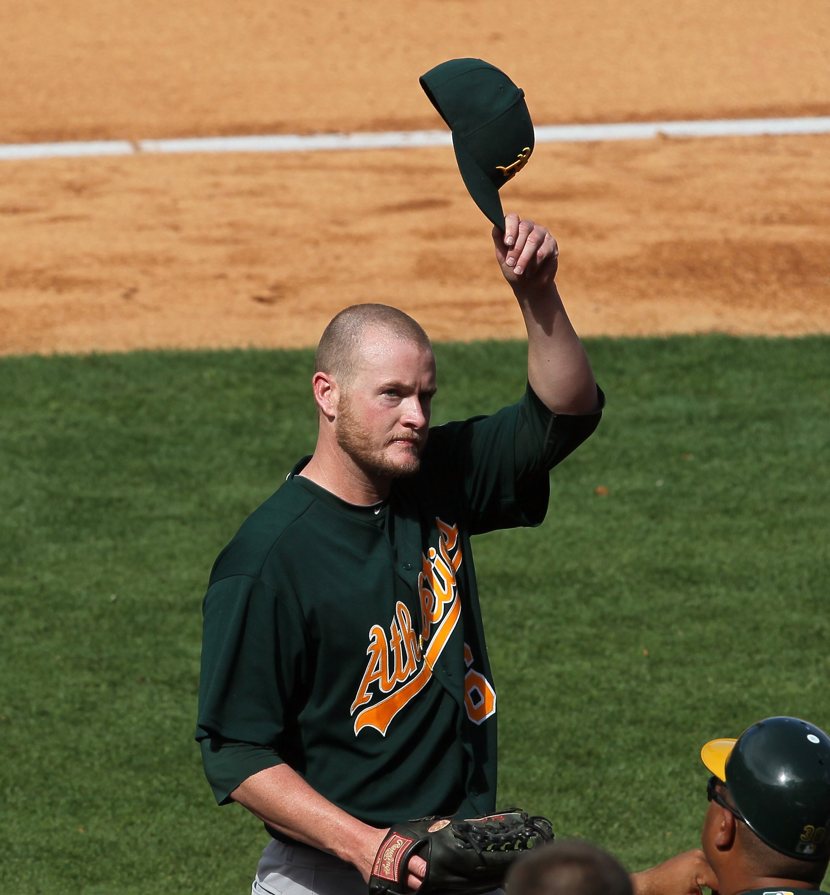 ANAHEIM, CA - SEPTEMBER 29:  Bobby Cramer #64 of the Oakland Athletics tips his cap to his home town family and fans as he is relieved in the seventh inning against the Los Angeles Angels of Anaheim on September 29, 2010 at Angel Stadium in Anaheim, Calif