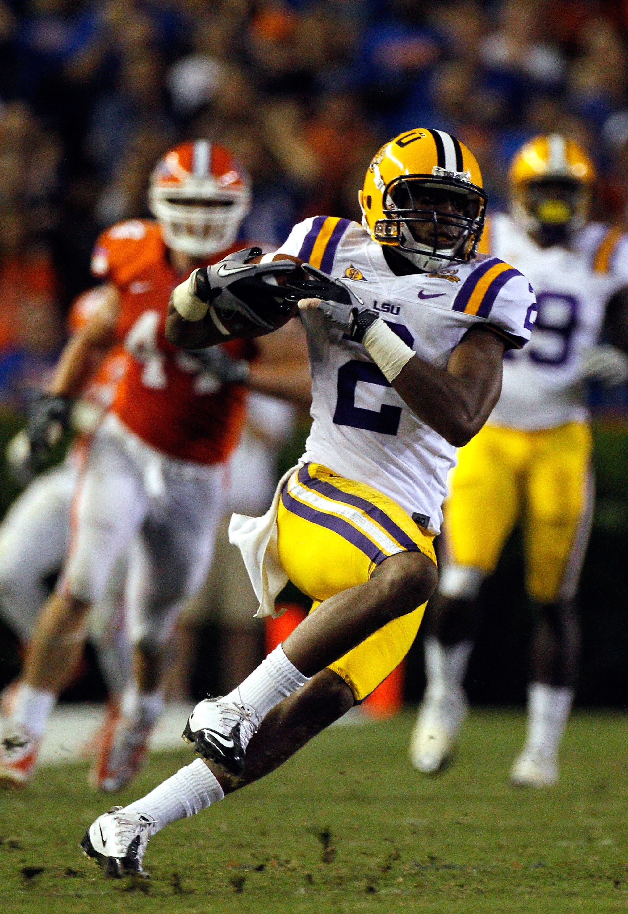 GAINESVILLE, FL - OCTOBER 09:  Rueben Randle #2 of the Louisiana State University Tigers runs after making a reception against the Florida Gators during the game at Ben Hill Griffin Stadium on October 9, 2010 in Gainesville, Florida.  (Photo by Sam Greenw