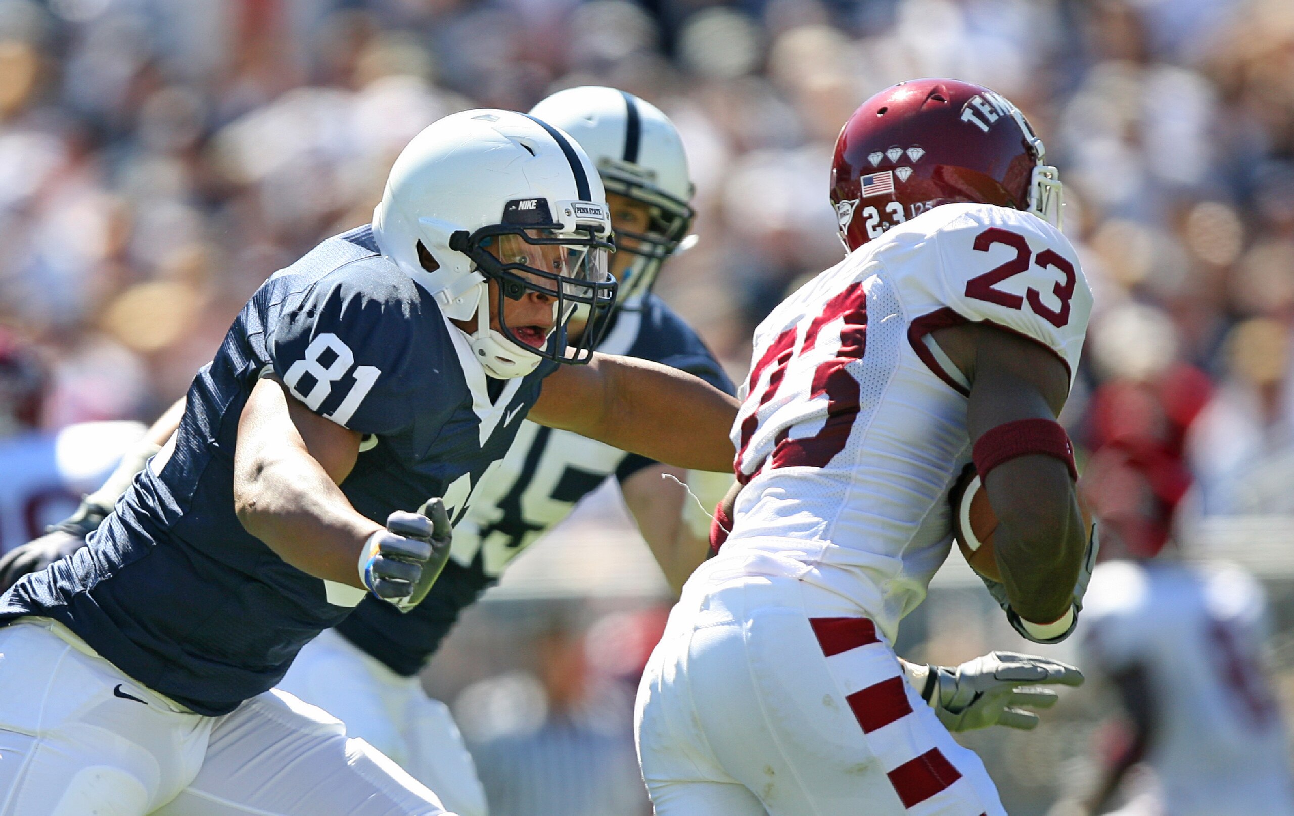 STATE COLLEGE, PA - SEPTEMBER 19: Defensive end Jack Crawford #81 of the Penn State Nittany Lions pursues wide receiver James Nixon #23 of the Temple Owls during a game on September 19, 2009 at Beaver Stadium in State College, Pennsylvania. (Photo by Hunt