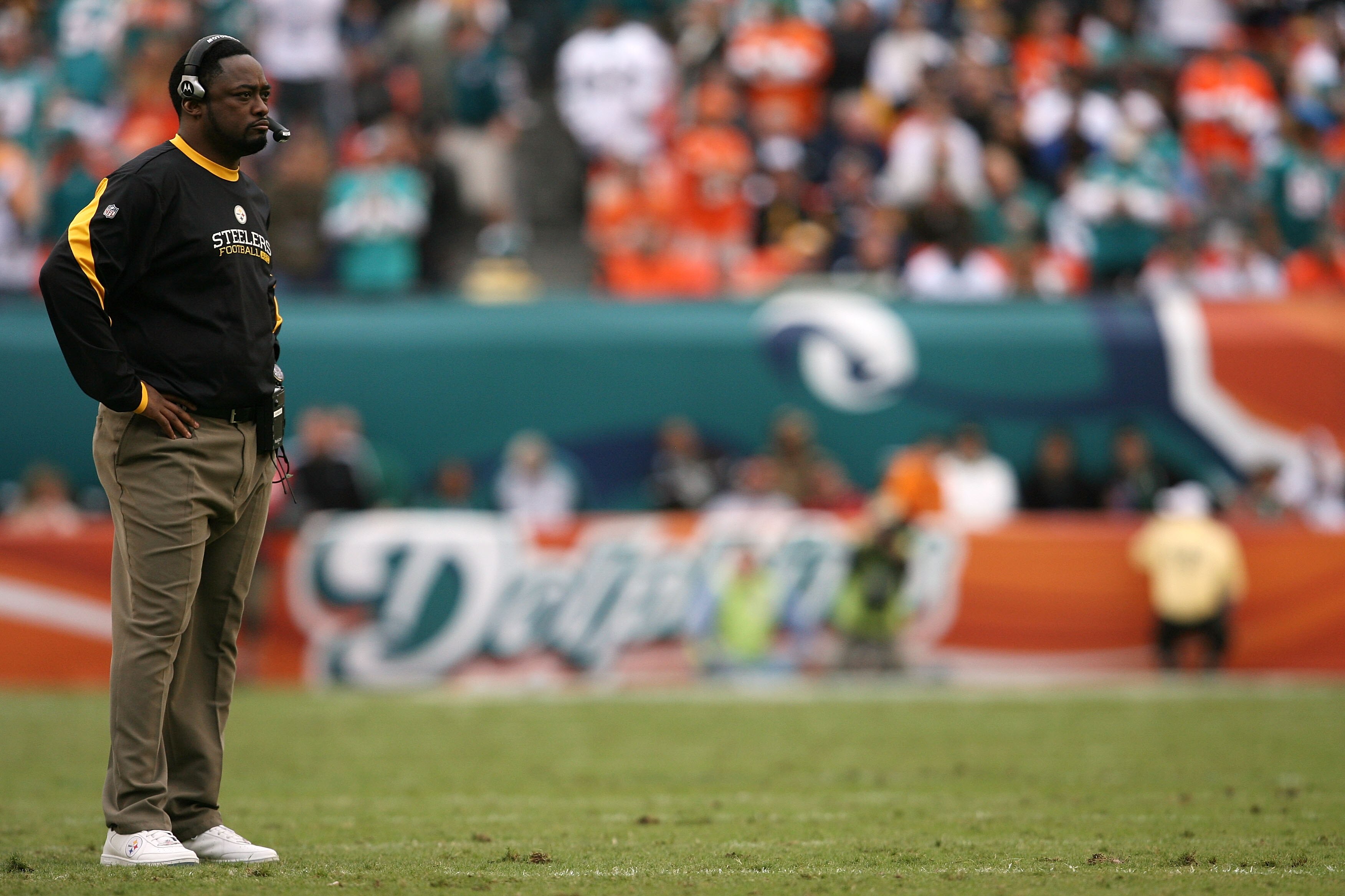 MIAMI - JANUARY 03:  Head coach Mike Tomlin of the Pittsburgh Steelers watches from the sidelines after the Miami Dolphins pull to within three points in the fourth quarter at Land Shark Stadium on January 3, 2010 in Miami, Florida. The Steelers defeated 