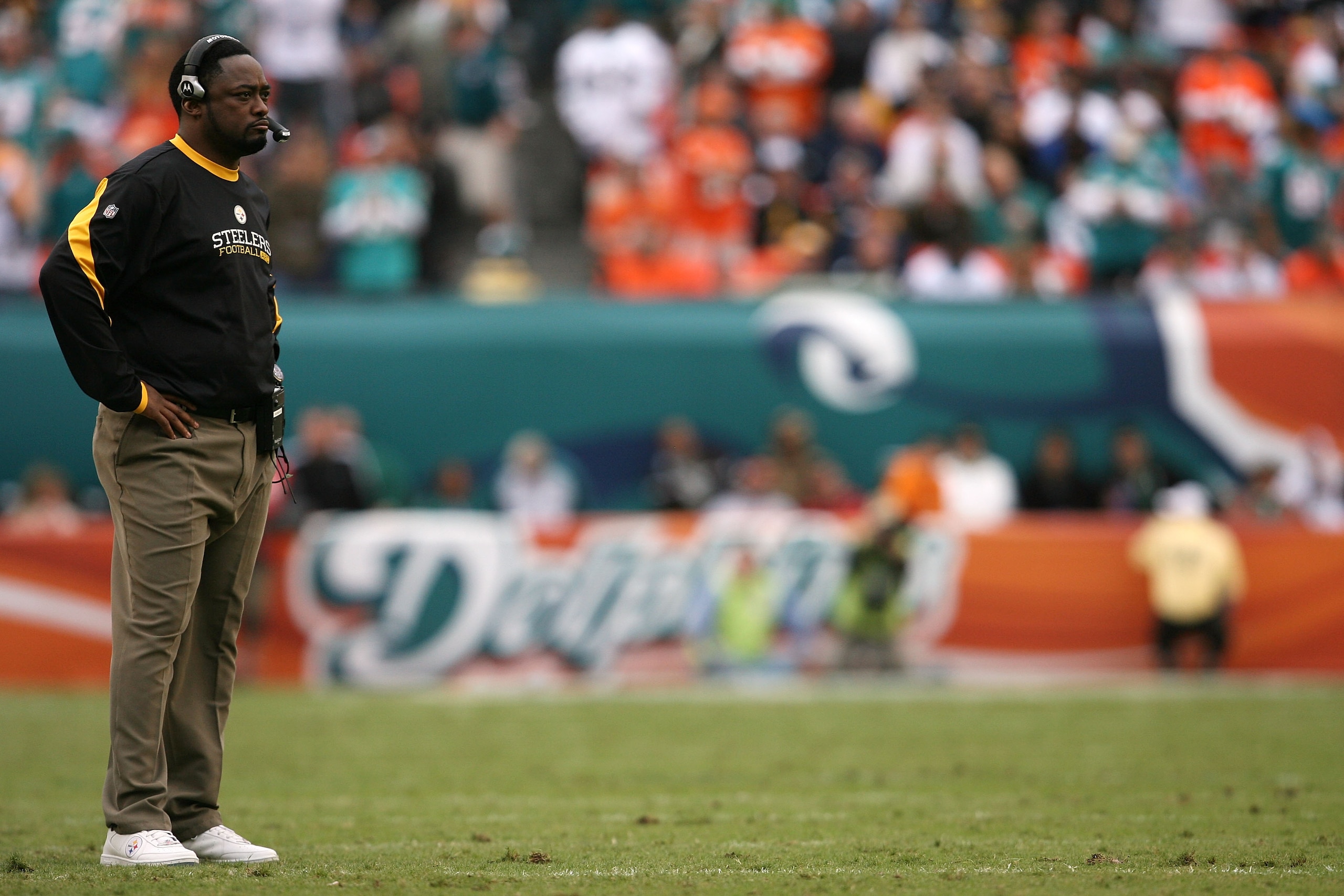 MIAMI - JANUARY 03:  Head coach Mike Tomlin of the Pittsburgh Steelers watches from the sidelines after the Miami Dolphins pull to within three points in the fourth quarter at Land Shark Stadium on January 3, 2010 in Miami, Florida. The Steelers defeated 