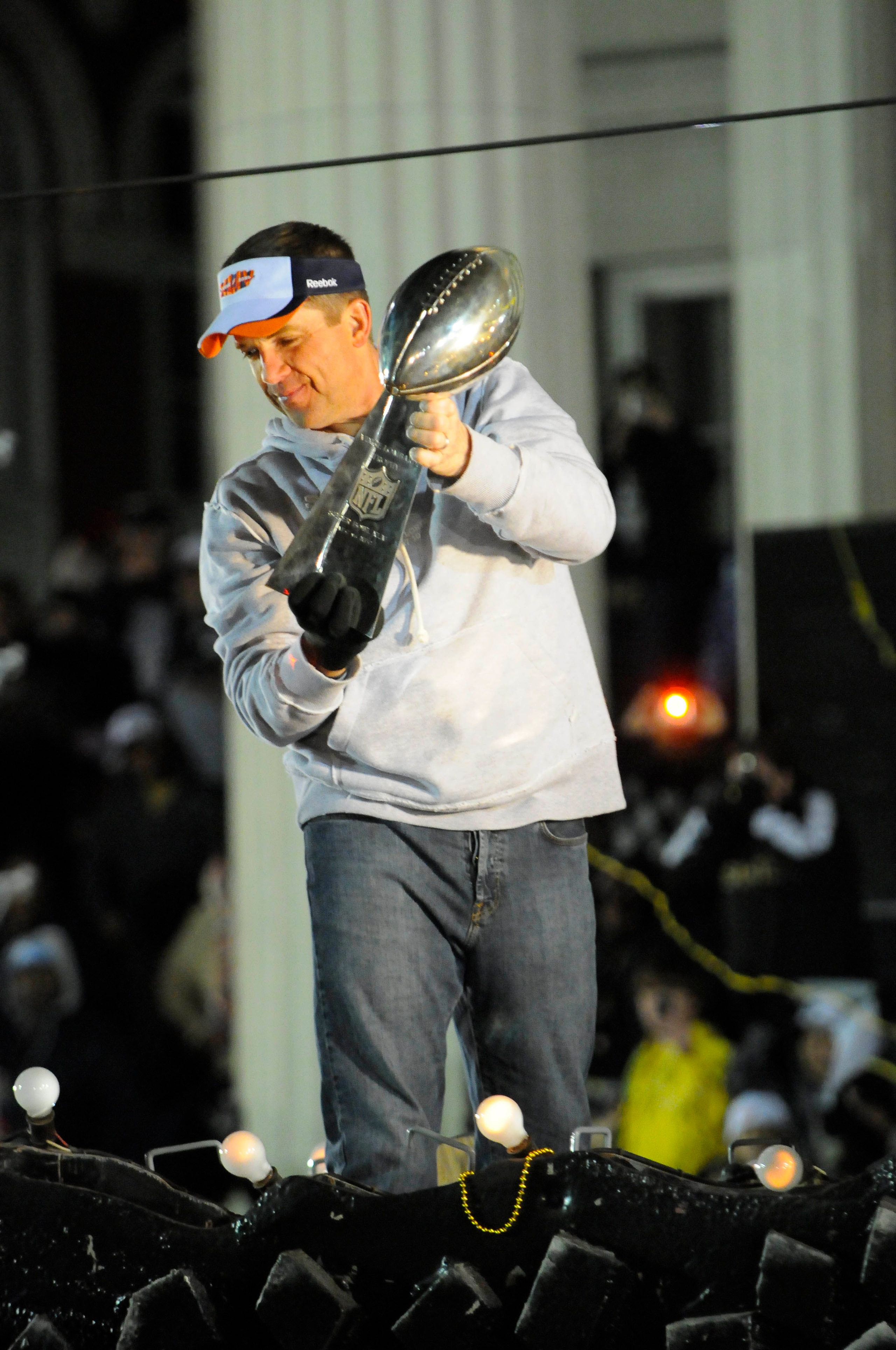 NEW ORLEANS - FEBRUARY 09:  New Orleans Saints coach Sean Peyton holds up the Lombardi trophy as he celebrate during the New Orleans Saints Super Bowl XLIV victory parade on St. Charles Avenue February 9, 2010 in New Orleans, Louisiana.  (Photo by Cheryl
