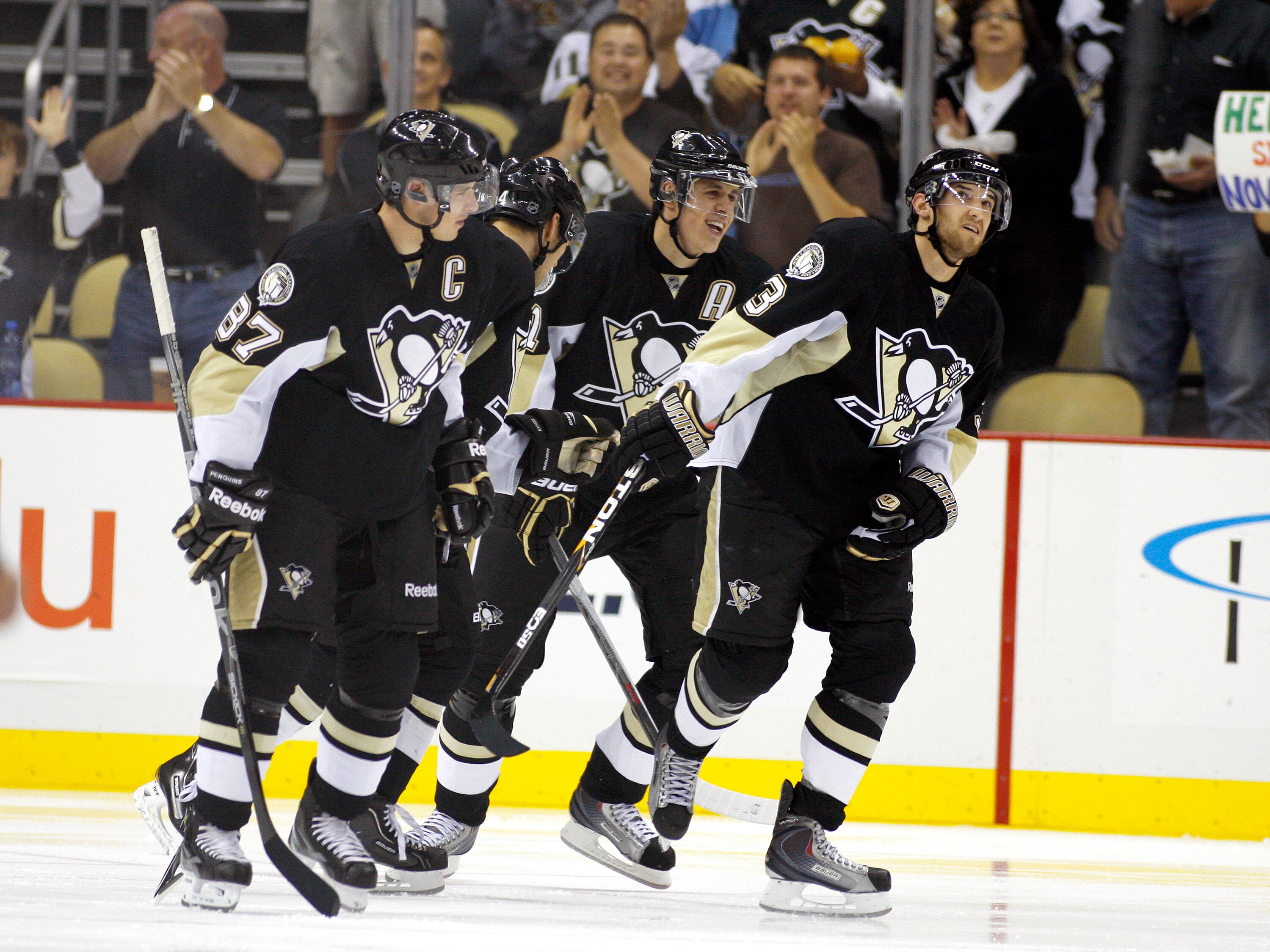 PITTSBURGH - OCTOBER 9:  Evgeni Malkin #71 of the Pittsburgh Penguins celebrates his second period power play goal with teammates against the Montreal Canadiens at Consol Energy Center on October 9, 2010 in Pittsburgh, Pennsylvania.  (Photo by Justin K. A