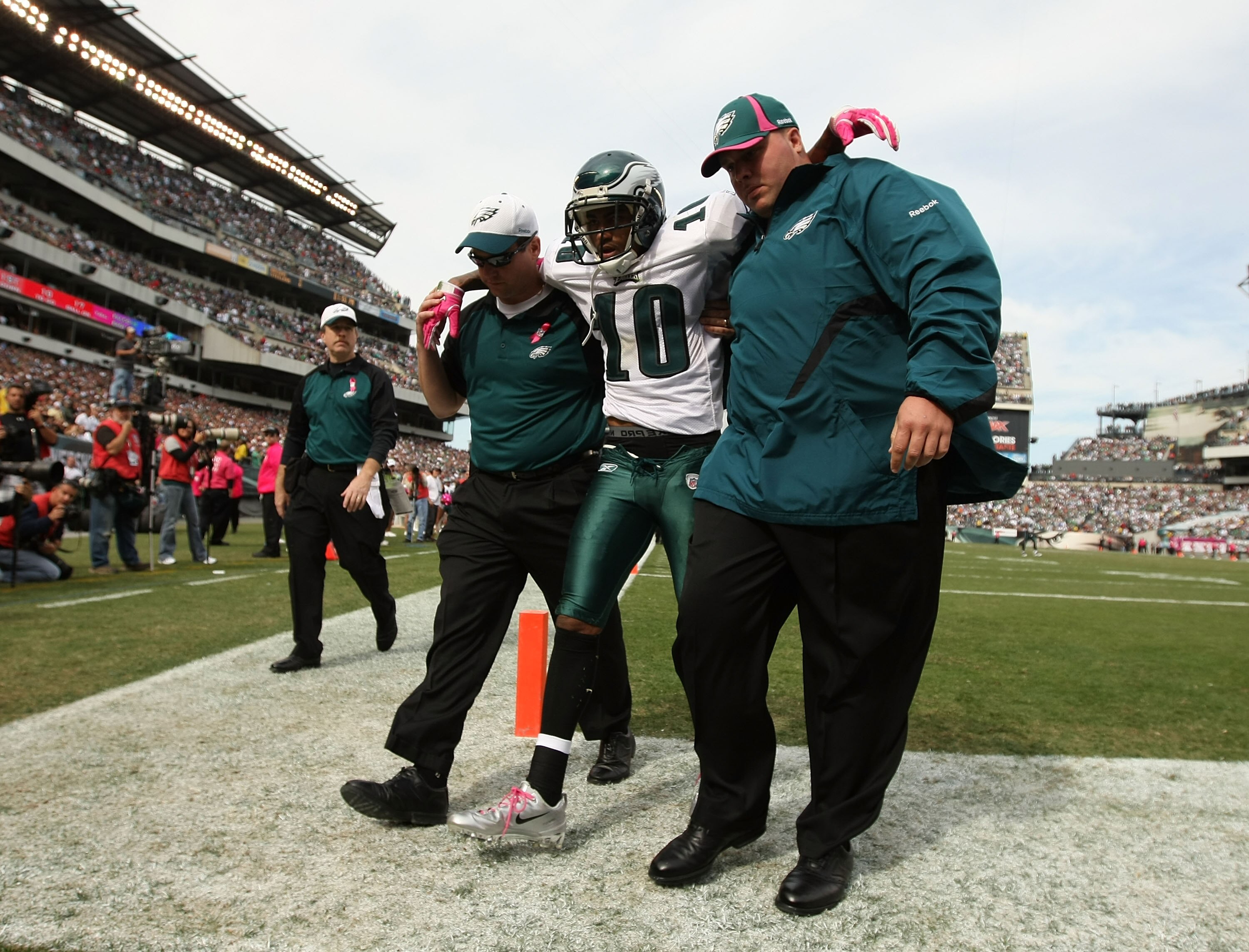 PHILADELPHIA - OCTOBER 17:  DeSean Jackson #10 of the Philadelphia Eagles is helped off the field after being  laid out by Dunta Robinson #23 of the Atlanta Falcons during their game at Lincoln Financial Field on October 17, 2010 in Philadelphia, Pennsylv