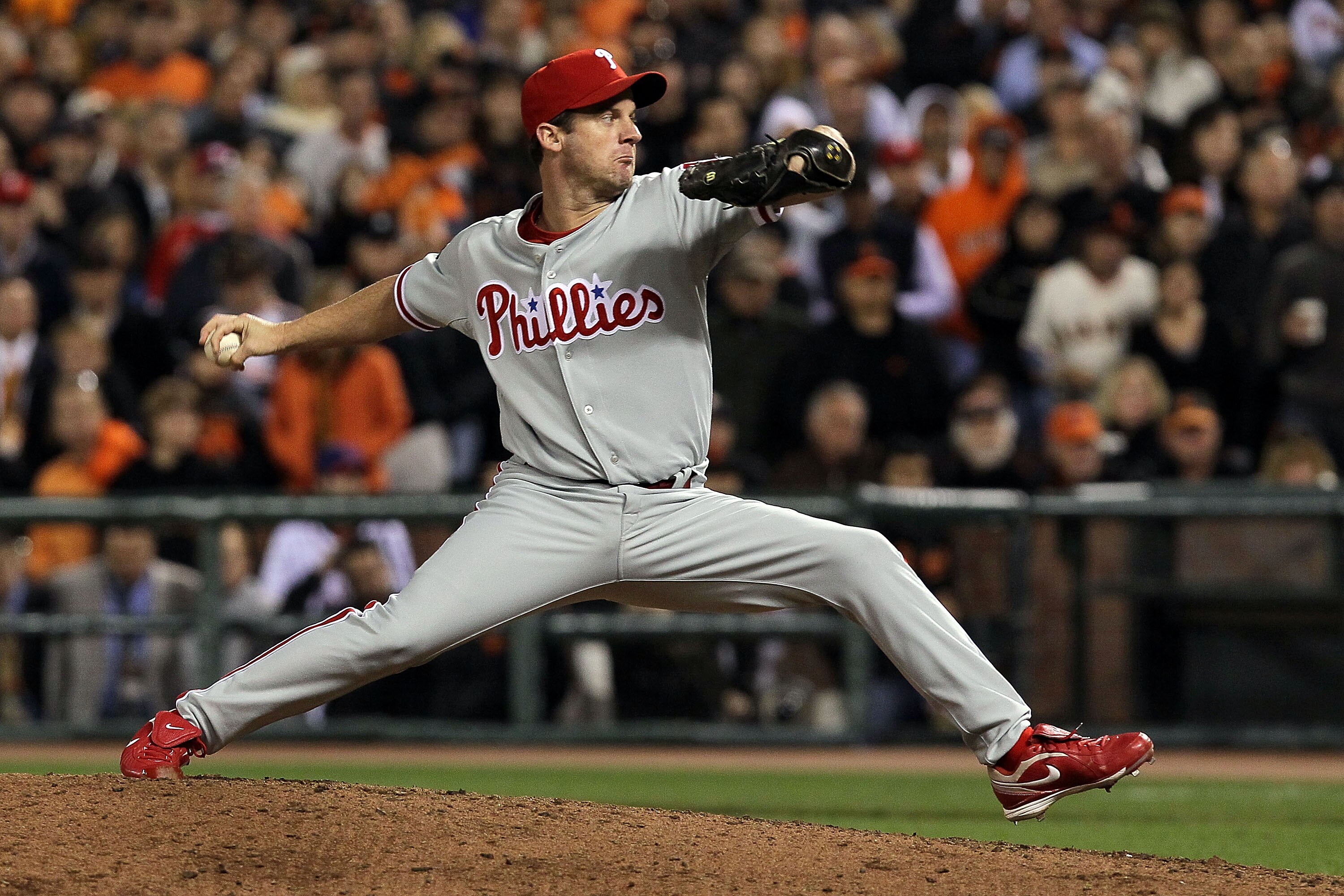 SAN FRANCISCO - OCTOBER 20:  Roy Oswalt #44 of the Philadelphia Phillies pitches in the ninth inning while taking on the San Francisco Giants in Game Four of the NLCS during the 2010 MLB Playoffs at AT&T Park on October 20, 2010 in San Francisco, Californ