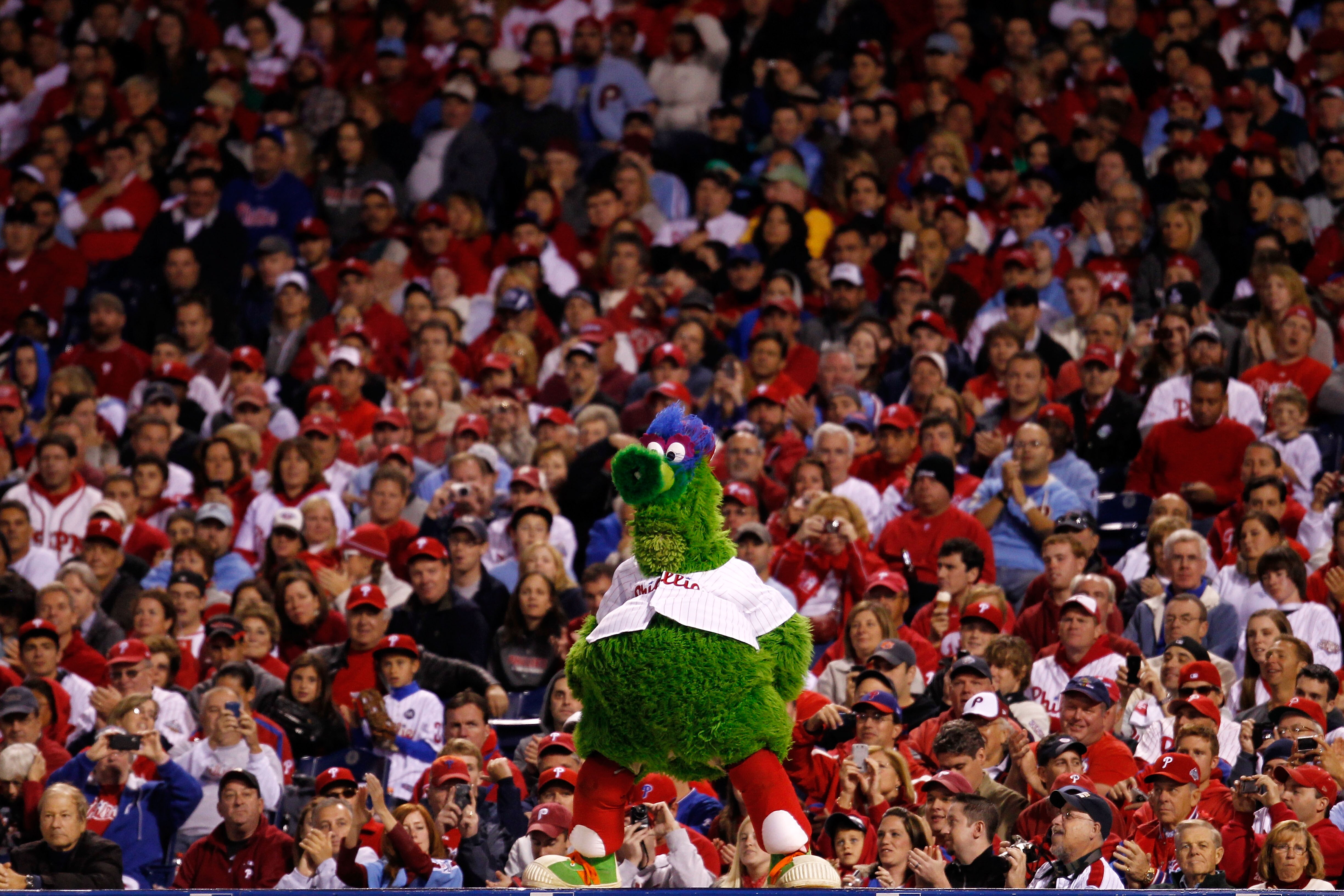 PHILADELPHIA - OCTOBER 17:  The Phillie Phanatic pumps up the crowd as the Phillies take on the San Francisco Giants in Game Two of the NLCS during the 2010 MLB Playoffs at Citizens Bank Park on October 17, 2010 in Philadelphia, Pennsylvania.  (Photo by J