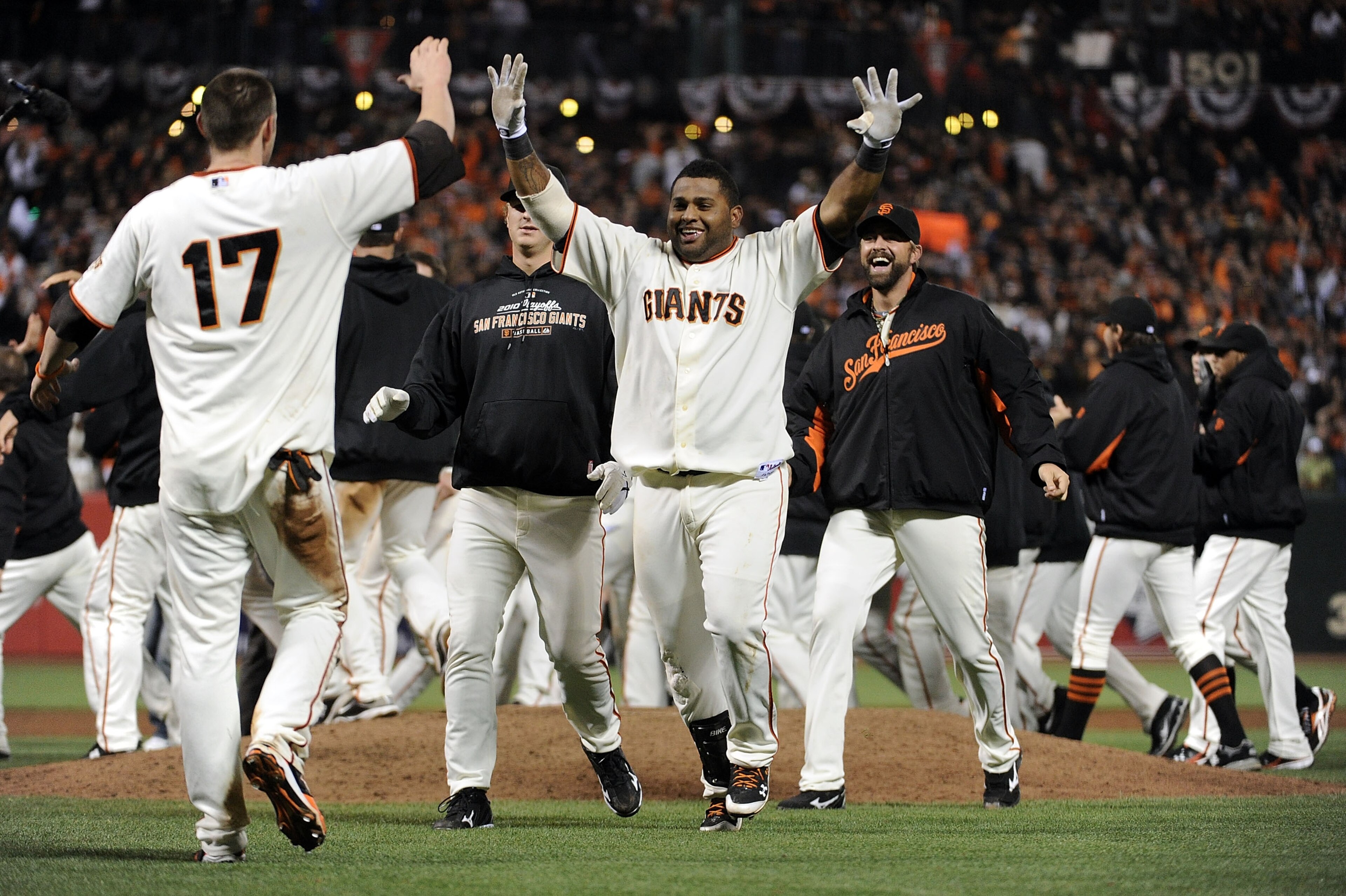 SAN FRANCISCO - OCTOBER 20:  Pablo Sandoval #48 (C) of the San Francisco Giants celebrates after Aubrey Huff #17 scored on a Juan Uribe #5 sacrifice fly to win the game 6-5 over the Philadelphia Phillies in Game Four of the NLCS during the 2010 MLB Playof