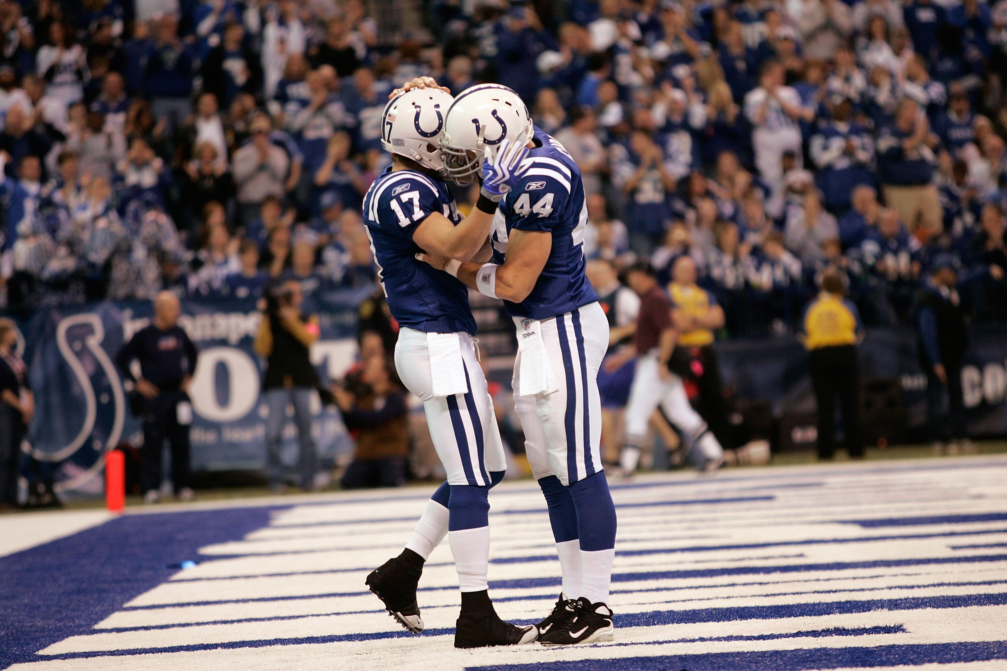 INDIANAPOLIS, IN - DECEMBER 6: Wide receiver Austin Collie #17 and Dallas Clark #44 of the Indianapolis Colts celebrate a touchdown against the Tennessee Titans at Lucas Oil Field on December 6, 2009 in Indianapolis, Indiana. The Colts defeated the Titans