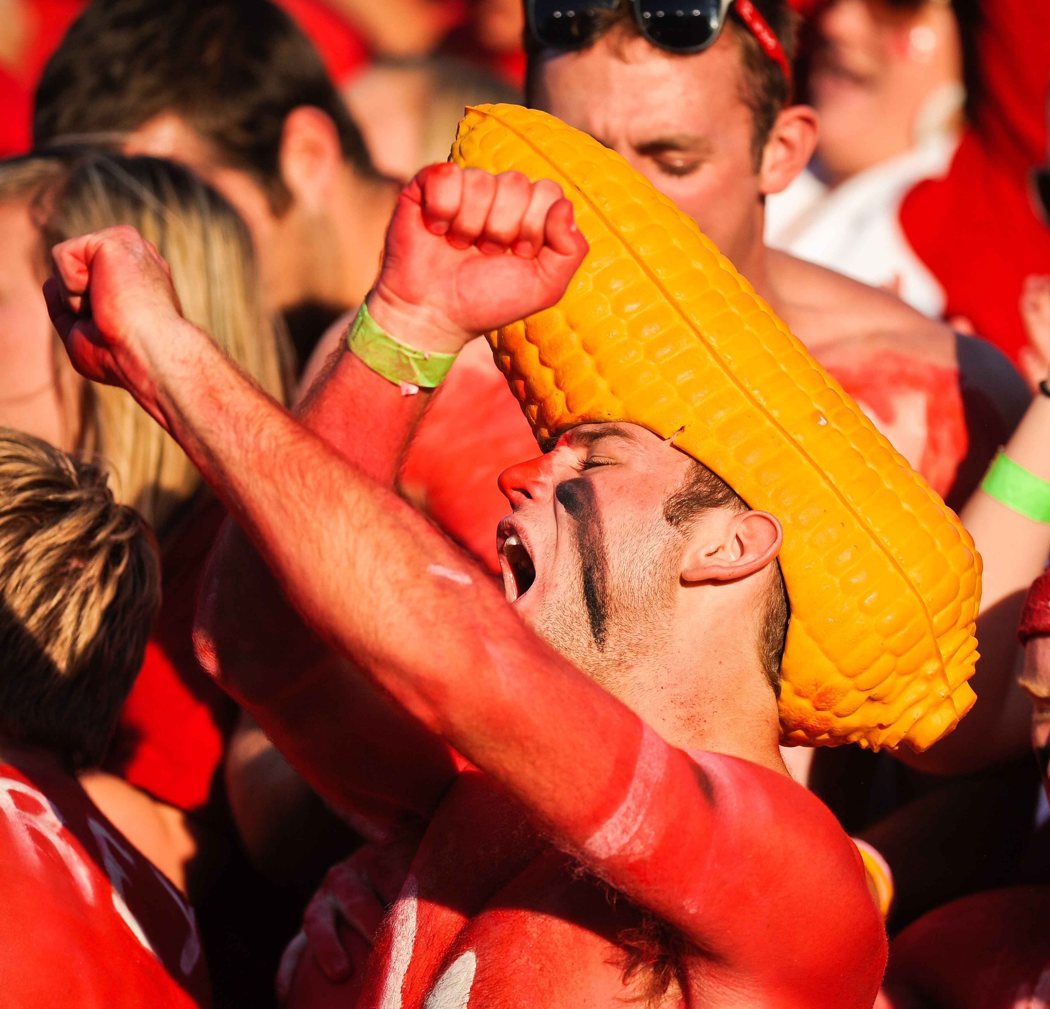 LINCOLN, NE - OCTOBER 16: Fans of the Nebraska Cornhuskers react after fourth a quarter punt return for a touchdown of their game against the Texas Longhorns at Memorial Stadium on October 16, 2010 in Lincoln, Nebraska. Texas Defeated Nebraska 20-13. (Pho