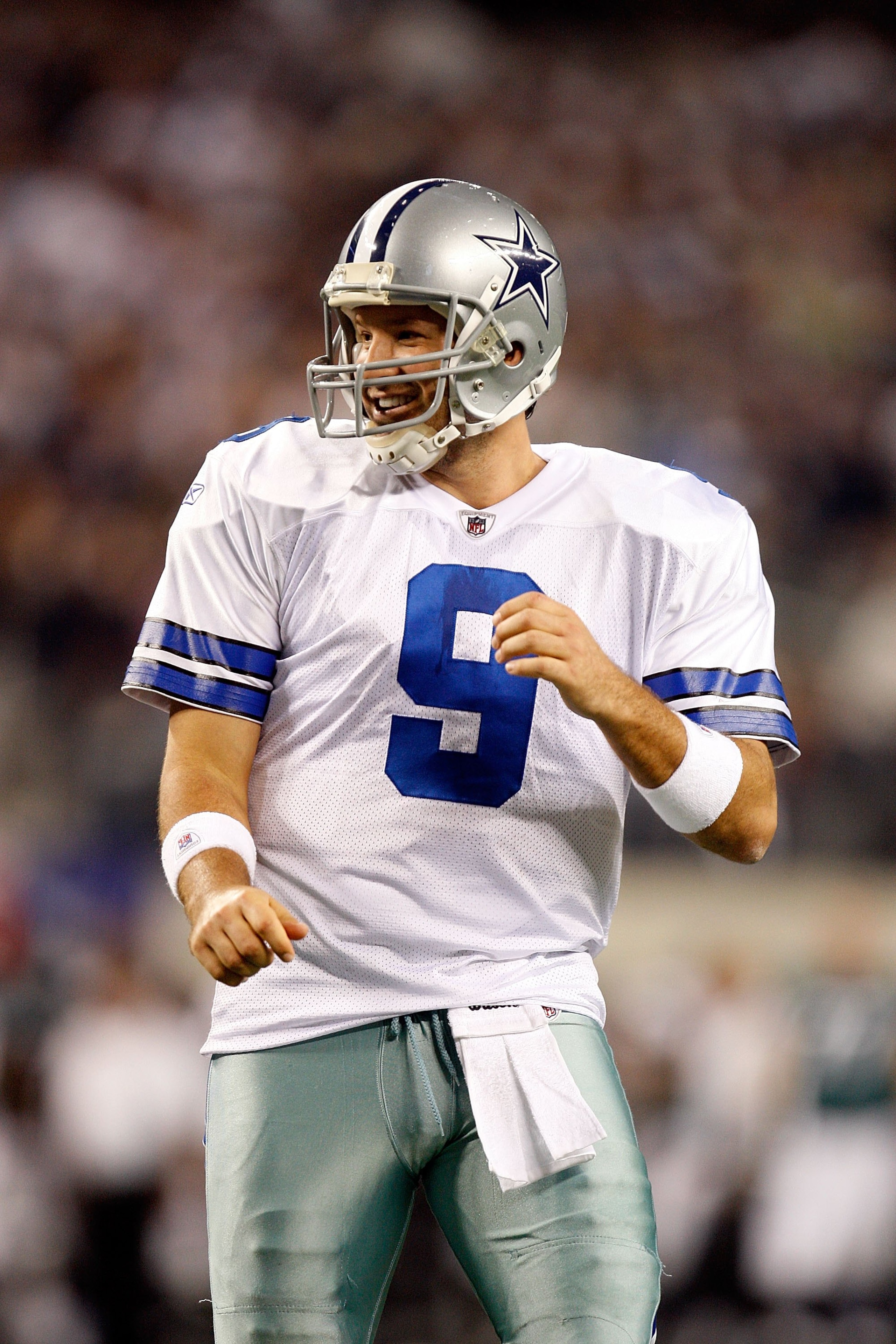 ARLINGTON, TX - JANUARY 09:  Quarterback Tony Romo #9 of the Dallas Cowboys during the 2010 NFC wild-card playoff game at Cowboys Stadium on January 9, 2010 in Arlington, Texas.  (Photo by Ronald Martinez/Getty Images)